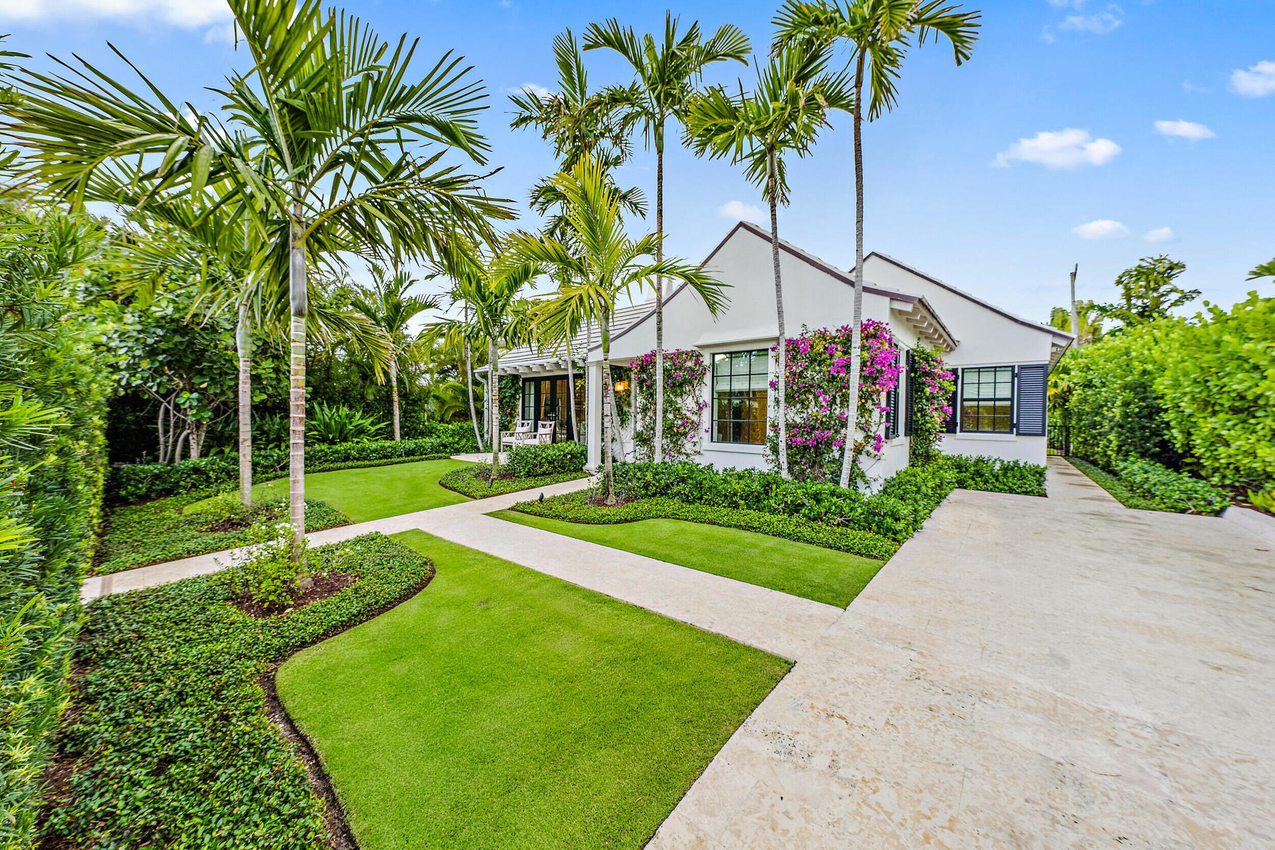 Your search has ended, this charming move in ready 3-bedroom, 3-bathroom Bermuda style home is situated in town, with prime ocean block location just seconds to the beach. This mid century residence was fully restored to its natural beauty after a 3 year long extensive renovation, designed by Pat Segraves and built by Chip Janssen, no expense was spared. The main house features two bedrooms with a large master suite overlooking the pool. The stunning chef's kitchen boasts Cristallo countertops, Subzero appliances, and an oversized island. Beamed cathedral ceilings in living room and ESW windows and French doors throughout. Covered lanai is perfect for dining al fresco, relaxing poolside or enjoying the spacious garden and landscaping that was designed by Parker-Yanette Design Group. The quaint guest house features a large living area, separate bedroom,and walk-in closet. Enjoy all the beauty Palm Beach has to offer with your own private oasis in the heart of it all.