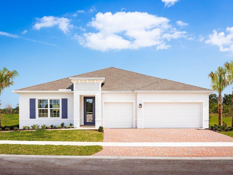 Never-lived-in former Ryan Homes model featuring 4BR/3BA, 3-car garage and upgrades in gated Lost Tree Preserve. Enjoy gym, pool, dog parks, sidewalks—just 7 miles from Vero Beach."