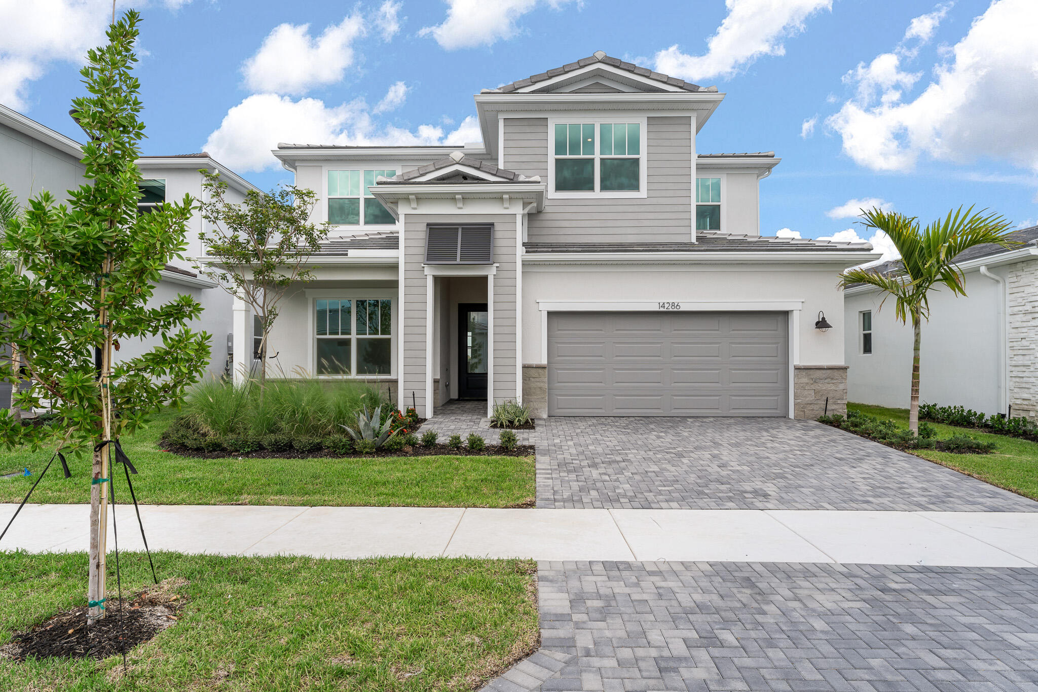 The Wynn is a 2,900 sq. ft. 2-story home that offers 4 bedrooms, 3.5 baths and 2-car garage. Upon entering the foyer, you are welcomed to an open floorplan. The spacious kitchen offers an extensive walk-in pantry and an island breakfast bar. The kitchen overlooks the dining area and Great Room. A sliding glass door in the Dining Room leads to the covered lanai. Bedroom 4, located on the first floor, connects to a full bath and walk in closet. The second floor is complete with a loft, owner's suite and bath, two additional bedrooms and a full bath. The roomy loft offers a flexible living space. The owner's suite boasts a large walk-in closet and is connected to the owner's bath with a spacious shower and dual sink raised vanity.