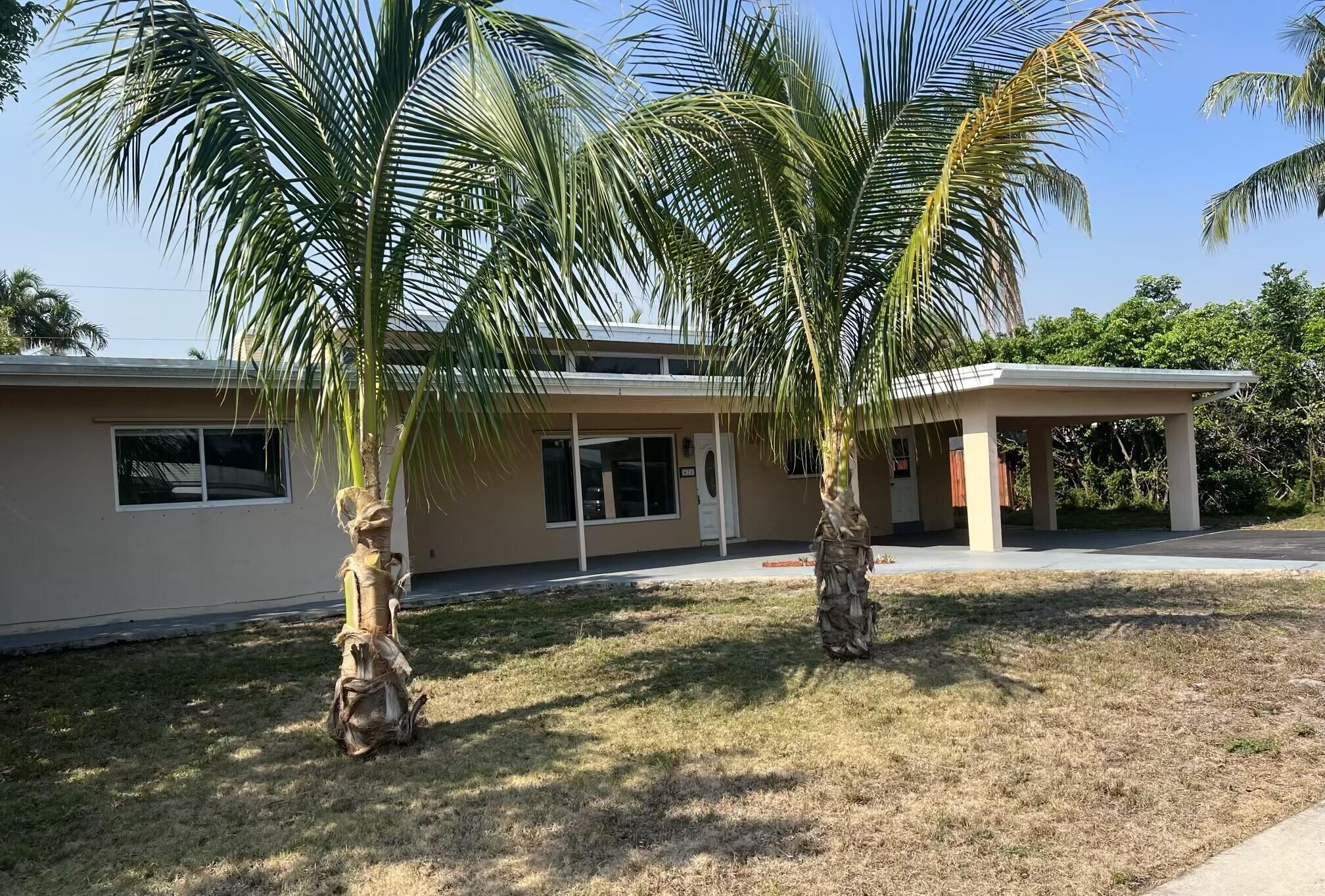 Discover the perfect blend of comfort, character, and location in this charming 3-bedroom, 2-bathroom home featuring a cozy fireplace, large kitchen and a spacious 2-car carport. Nestled in one of East Boca Raton's most desirable neighborhoods, this residence offers an exceptional South Florida lifestyle just minutes from the Intracoastal Waterway, pristine Atlantic beaches, and vibrant downtown Boca Raton.  Enjoy easy access to Mizner Park's upscale shopping, dining, entertainment, cultural attractions, and year-round events. Florida Atlantic University, Boca Regional Hospital, and the Brightline station are all conveniently nearby. Outdoor enthusiasts will appreciate the proximity to waterfront parks, boating, fishing, golf courses, and scenic biking routes along the coast.  . Just moments from Boca Raton's renowned restaurants, boutiques, and nightlife, as well as the popular Atlantic Avenue district in Delray Beach, this location offers endless opportunities for recreation and entertainment. Quick access to I-95 provides seamless connectivity to Fort Lauderdale, West Palm Beach, and Miami. Combining timeless appeal with an unbeatable East Boca location, this home is an exceptional opportunity to enjoy the best of coastal living and urban convenience.