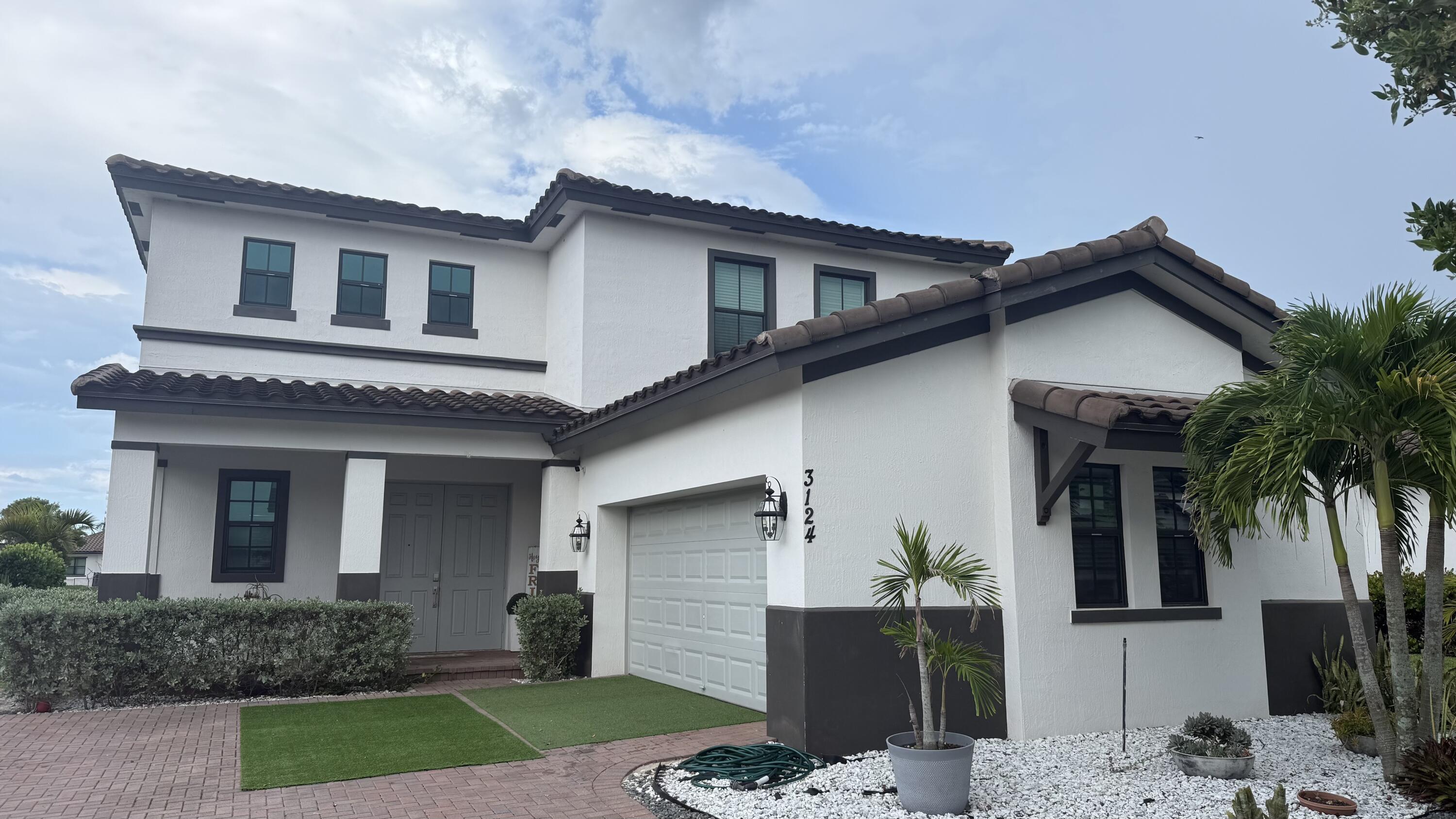 Welcome to this spacious 2-story single-family residence in Crestwood North, Royal Palm Beach, offering 2,932 square feet of above-grade living space. This well-appointed home features 5 bedrooms and 3 bathrooms, providing ample room for comfortable living and flexibility for various needs. The two-car garage offers convenient parking and storage solutions. Located in the established Crestwood North community, this property presents an excellent opportunity for those seeking a substantial home with multiple bedrooms and bathrooms in the Royal Palm Beach area. Bellasera is a gated community with a low HOA and lots of amenities including: Clubhouse, Pool, Tennis, Play Ground, Gym and Kids Room. Minutes drive to Beaches, PBI Airport, World Class Golf, Community Parks.