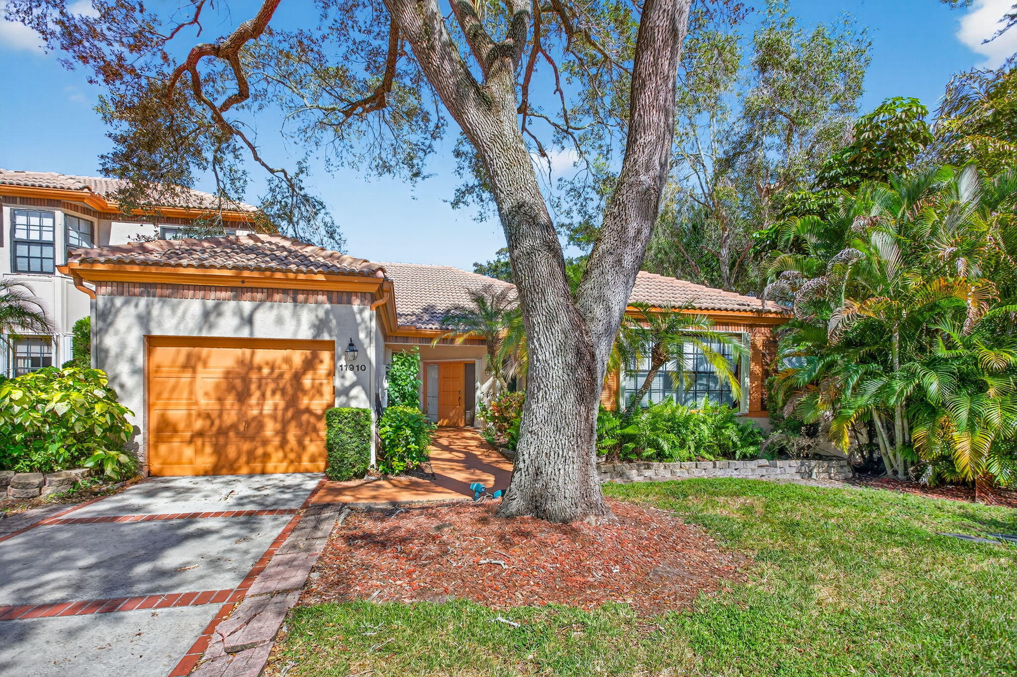 Step into stylish South Florida living with this fully renovated villa, beautifully situated in the prestigious community of Eagle Trace. Boasting approximately 2,145 sq ft, this residence features three spacious bedrooms, three and a half baths, a dedicated den, a one-car garage, and a serene screened-in lanai overlooking your private backyard sanctuary. Inside, you'll immediately notice the meticulous upgrades: quartz countertops, new wood-look flooring from room to room, brand-new appliances fully integrated into a sleek, modern kitchen, and bathrooms that feel fresh and refined from top to bottom. The floor plan flows effortlessly: the main living area invites you in and opens to the kitchen and den, while the screened lanai offers a tranquil space for morning coffee or evening relaxation. Each bedroom is generously sized and complemented by its own bath, giving everyone their own retreat. Outside, the one-car garage and yard space add value, comfort, and convenience.  Located in Eagle Trace, you'll enjoy more than just your home: the community lifestyle, proximity to major highways for an easy commute, and access to all that Coral Springs has to offer. Whether you're running errands, dining out, or finding your favorite gym, this location delivers. With a turnkey interior and exceptional updates, this villa is truly ready for you to move in, unpack, and start living the life you deserve.