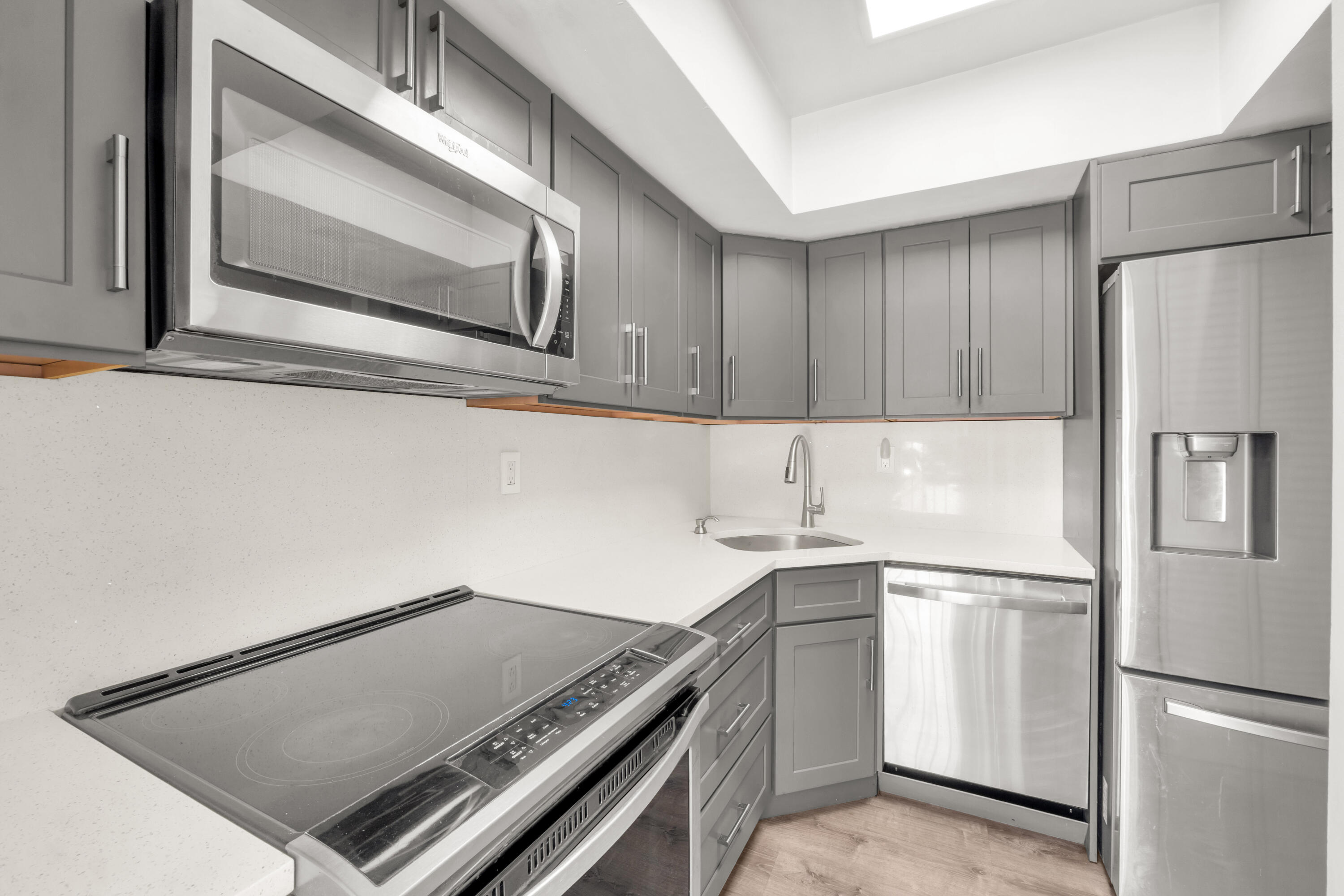 This immaculate unit in the heart of Fort Lauderdale boasts premium finishes and meticulous upkeep. Updated Unit, this 2BR/2BA condo has everything you desire. Freshly painted. Brand new bedrooms flooring. No expense has been spared, with a complete kitchen renovation including new cabinets, countertops, sliding glass door, LED lighting, and stainless-steel appliances. The bright and airy living space features updated flooring, and abundant natural light streams through large windows. Relax on the screened patio overlooking the serene courtyard and canal. Enjoy the convenience of being close to grocery stores, restaurants, shops, parks, the beach, and the airport. Pets are welcome, and tandem parking for 2 cars. Don't miss out on this exceptional opportunity. Easy to show.