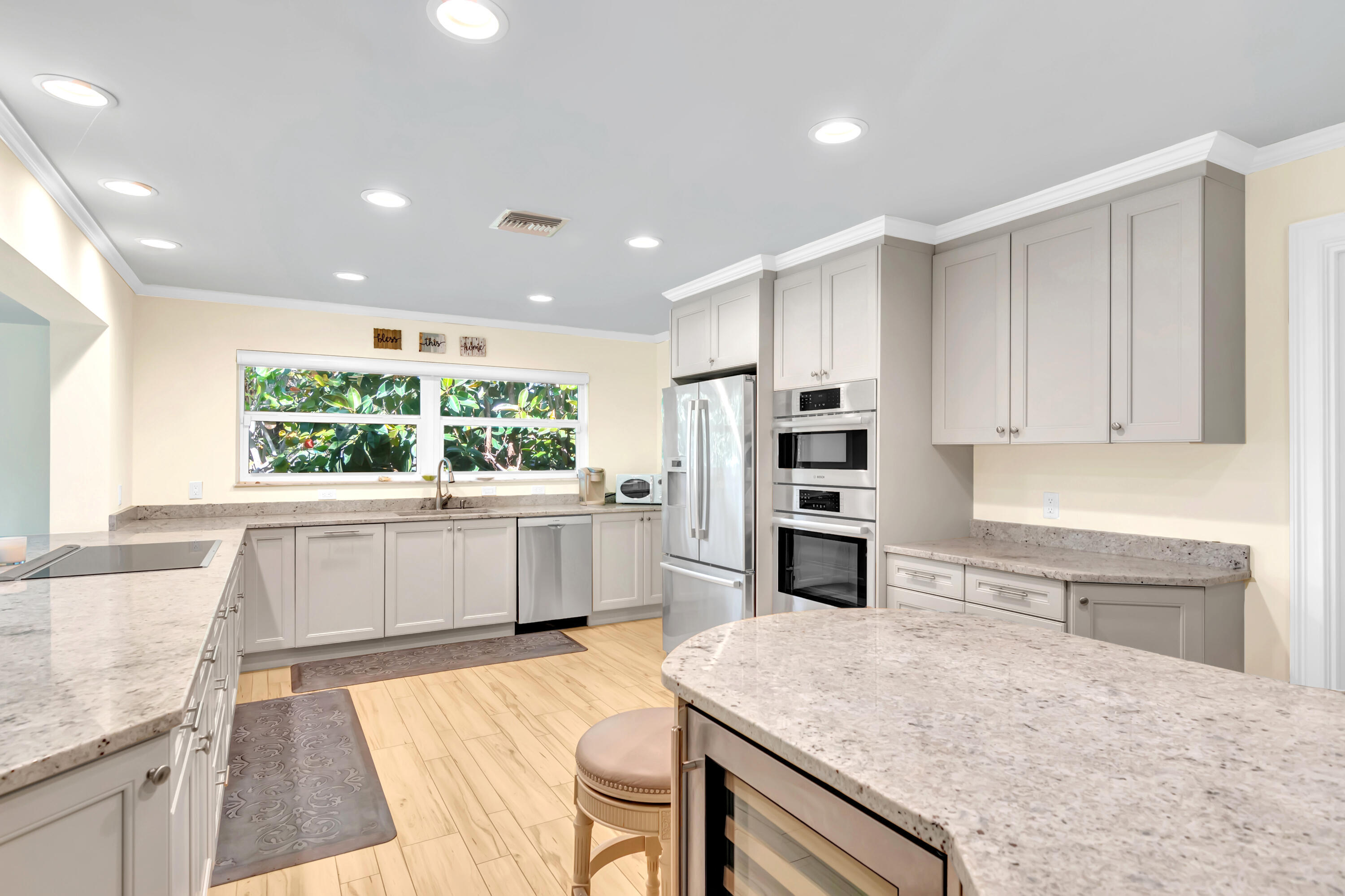 Corner lot in Central Beach just steps from Riverside Park, the theater and art museum. Beautifully remodeled by Helmet House in 2018, this 4 BR/3 BA home features a cook's kitchen with stainless Bosch appliances, granite countertops and a walk-in pantry. Spacious, inviting master suite offers two walk-in closets and en-suite bath. Impact windows and doors throughout; desirable location and thoughtful upgrades combine for easy, stylish coastal living.