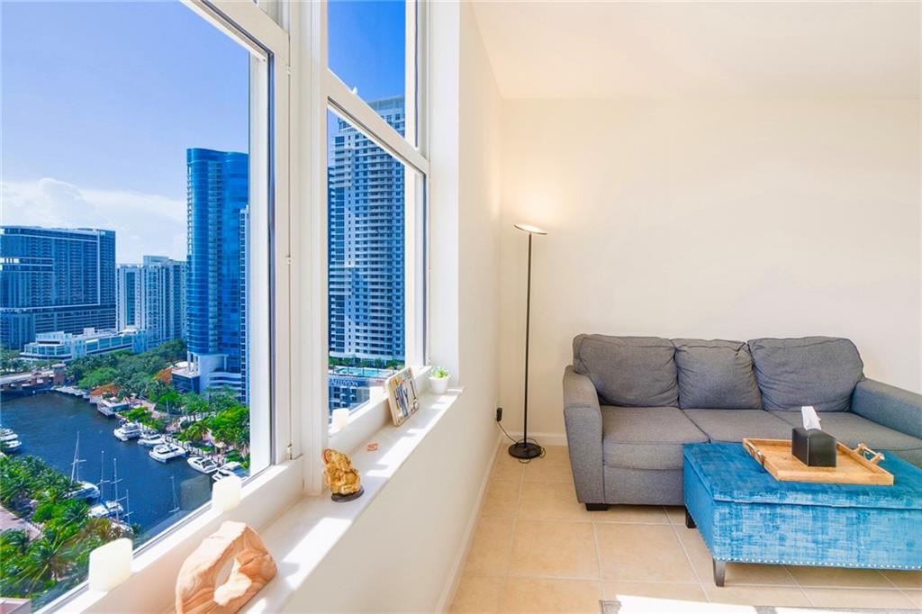 THE LARGEST, MOST UNIQUE 2 BEDROOM RIVER VIEW FLOORPLAN IN THE BUILDING! High floor, corner unit in the popular “14” stack. Stunning River, Sunset, South Facing Views. Additional living room window for more natural light than the typical 2 bedroom unit in building. Great condition, move-in ready. HOA includes unlimited water + all amenities. Pet & investor friendly. Resort Style Amenities: 24 hr concierge, security, front desk, package room, rooftop pool w/ unrivaled panoramic city, river & ocean views, sky lounge, bbq grills, fitness center, basketball + racquetball courts, yoga studio, jacuzzi, steamrooms, saunas, business center, meditation garden, secure parking.  Located directly on the New River & Riverwalk.  Walk 5 min to Las Olas Blvd for restaurants, shops, nightlife & more.