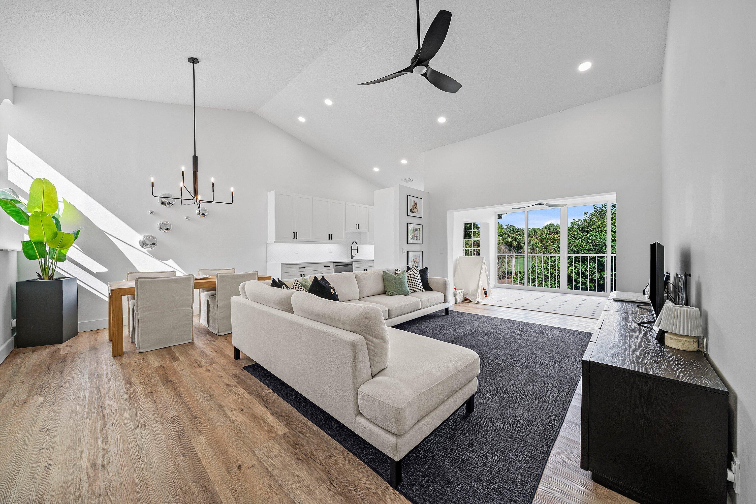 Beautifully renovated and filled with natural light, this stunning 3-bedroom, 2-bath residence offers refined living in an unbeatable Boca location. The thoughtfully designed open floor plan blends modern elegance with effortless comfort, creating the perfect space for both entertaining and everyday living. A standout feature is the enclosed sunroom thoughtfully converted from the balcony offering breathtaking lake and golf course views and additional living space. Located in Boca Country Club, enjoy the lifestyle and prestige of a country club community without mandatory membership or equity buy-in. Centrally located near beaches, dining, shopping, I-95, and zoned for A-rated schools. Welcome to your Boca dream!