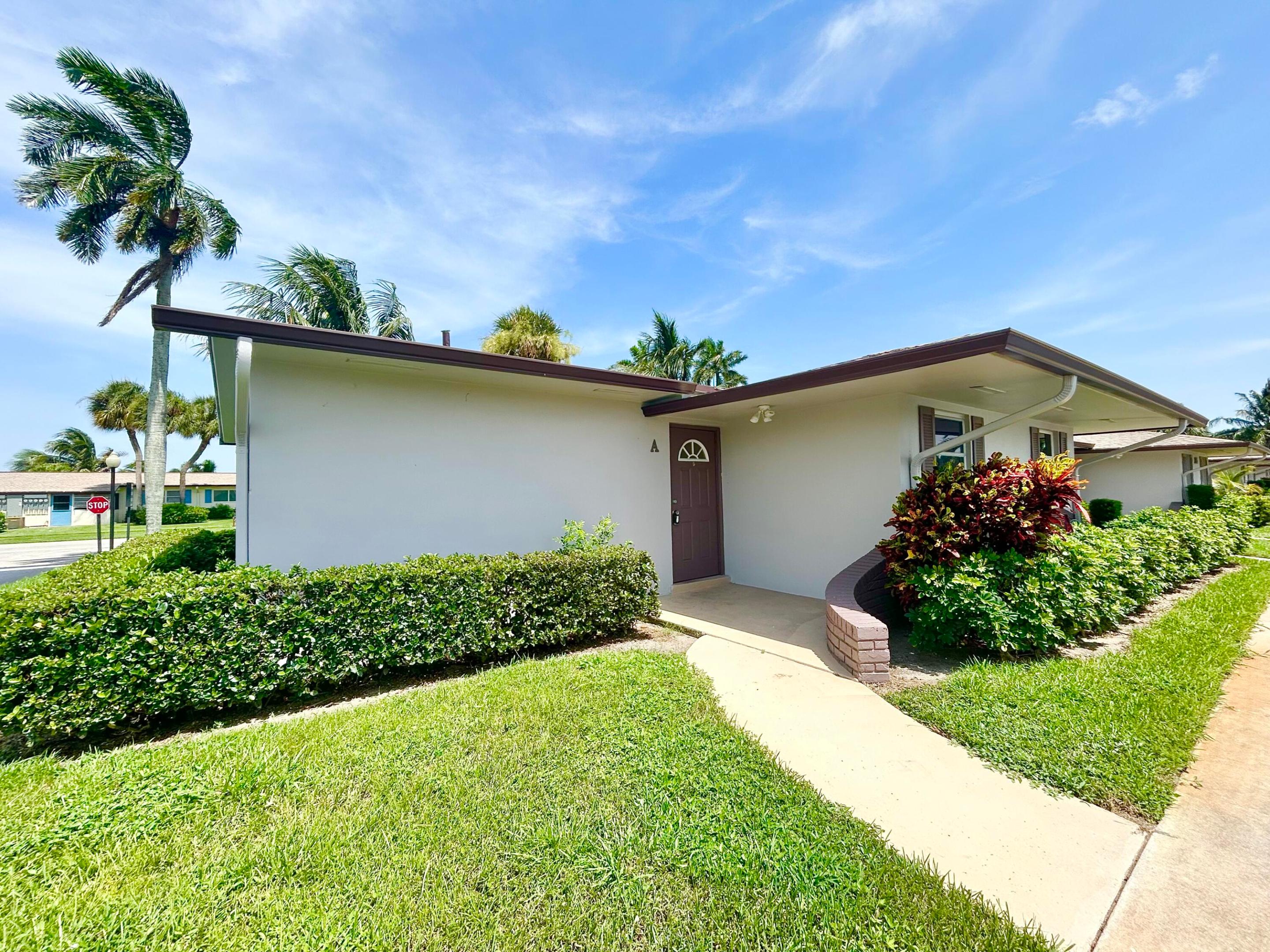 Lovely 1 bedroom 1 bath CORNER VILLA located in the 55+ community of Cresthaven Villas. This corner Villa is light and bright due to its Eastern exposure and extra windows on the side of the building. BRAND NEW A/C & ELECTRIC PANEL!!! Tile and laminate flooring throughout. Lots of storage with a full wall closet in the bedroom and 2 walk in storage closets, 1 on the porch and 1 in the hallway. Assigned parking space is right in front of the front door and plenty of guest parking spots. Common laundry is easy to use with each property having their own dedicated laundry time each week. The community has recently installed new roofs, freshly painted buildings and updated outside electrical. All assessments have been paid. The community carries reserves.  Buyers are required to have a 718 credit score and $40,000 annual income. These requirements must be met even by cash buyers. Financing requires 25% down. Service and emotional support animals are welcome. Patios and grilling are allowed. The amenities included are a resort style heated salt water pool, showers, sauna, locker rooms, clubhouse, auditorium, fitness center, billiards, library, bocce, shuffleboard and activities such as Bingo, pool tournaments, planned excursions, games, cards, parties etc. Close to beaches, medical and shopping. Low monthly maintenance of $434 includes water and cable & internet, building maintenance, roofs, lawn care and the recreational facilities.