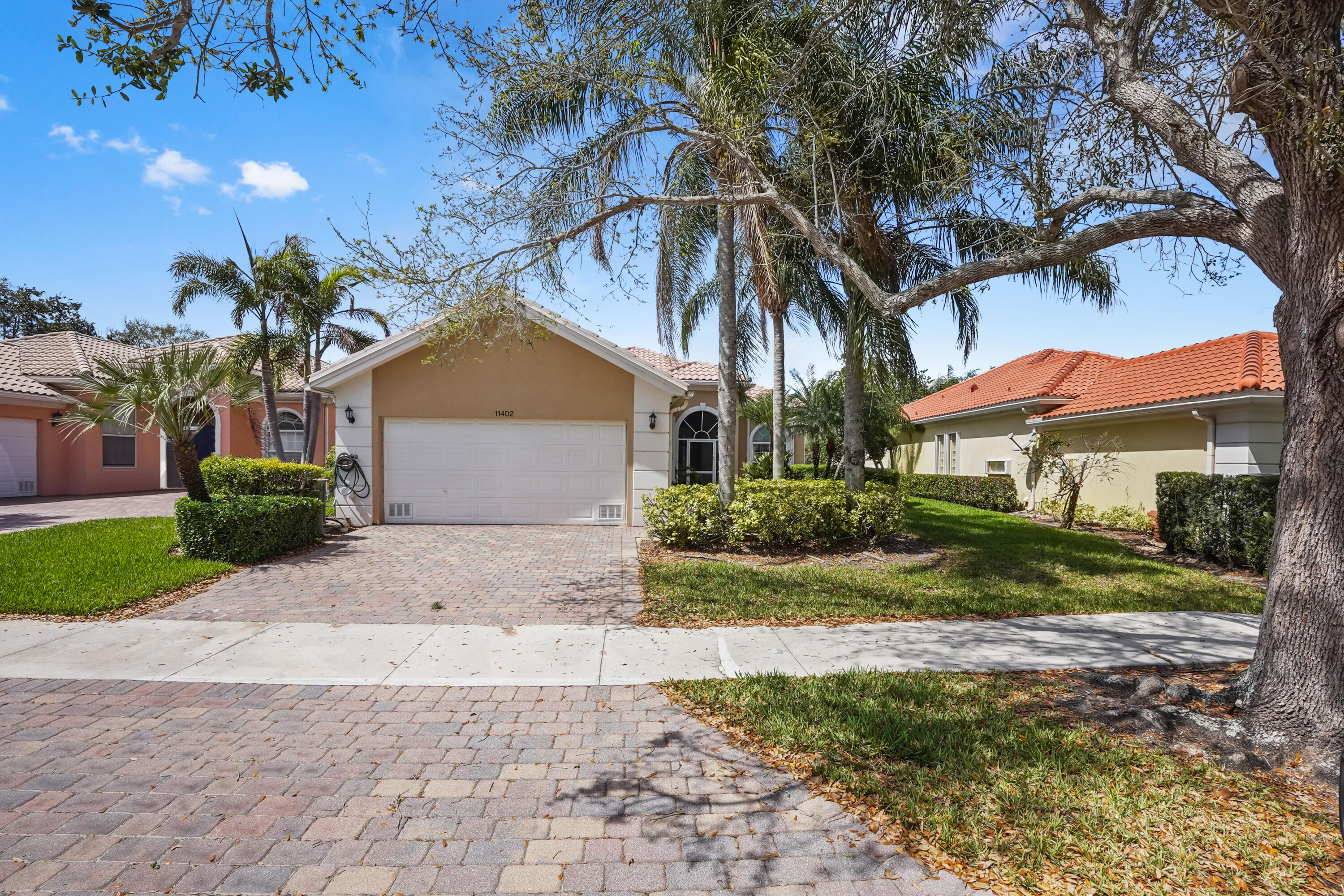PRICED TO SELL | This One Won't Last!  Welcome to waterfront living at its finest in The Lakes at Tradition — one of Port St. Lucie's most sought-after gated communities. This stunning 1-story, 3-bedroom + den/office, 3-bathroom waterfront home offers approximately 2,000 sq ft of beautifully designed living space, a 2.5-car garage, and breathtaking water views — all at an unbeatable price of $349,900.  WHY YOU'LL LOVE IT: • Serene waterfront views right from your own home • Spacious 2.5-car garage + extended driveway — perfect for guests • Open, flowing floor plan with 3 bedrooms PLUS a den/office • Light-filled living spaces designed for both relaxing and entertaining • Move-in ready — just unpack and enjoy the Florida lifestyle RESORT-STYLE COMMUNITY — YOUR HOA WORKS FOR YOU: Your monthly HOA covers cable TV, high-speed internet, lawn care, alarm monitoring, exterior painting, and 24/7 manned gate security. This is true lock-and-leave, maintenance-free living.  UNBEATABLE LOCATION: Steps from Downtown Tradition's restaurants, shops, and entertainment. Minutes to I-95, Cleveland Clinic, and the St. Lucie Mets stadium. Easy access to pristine Treasure Coast beaches.  Just reduced to $359,900. This is the deal of the season in Tradition. Homes with waterfront views in manned-gate