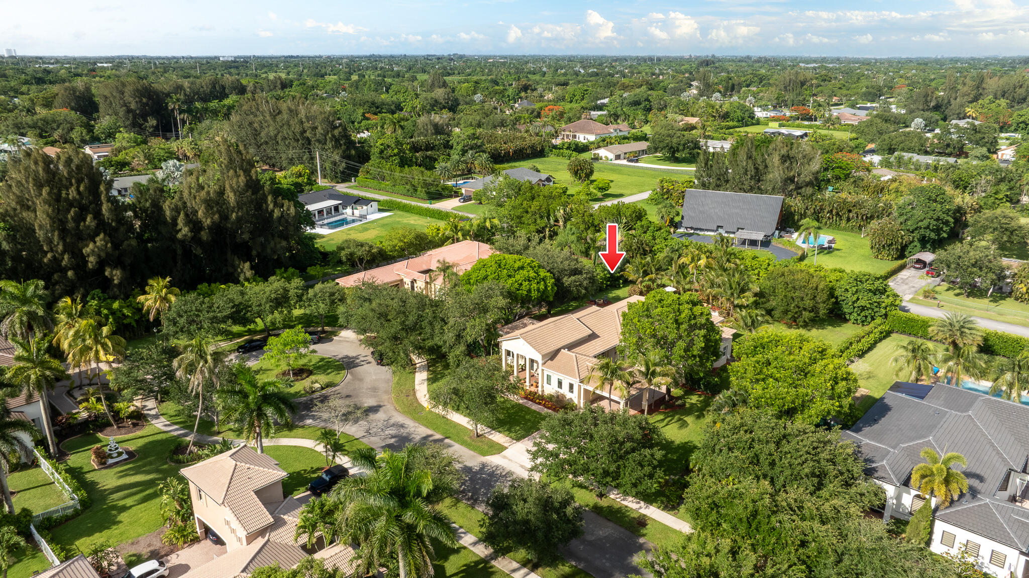 Welcome to this exceptional single-story residence in Groves Park, Davie, offering 4,057 square feet of thoughtfully designed living space. This five-bedroom, four-bathroom home provides ample room for diverse needs, whether accommodating guests, establishing a home office, or expanding your personal retreat. The two-car garage ensures convenient vehicle storage and protection. Every room flows naturally throughout the open floor plan, maximizing the usable square footage and creating an inviting atmosphere for daily living and entertaining. Located in the established Groves Park community, this property presents an outstanding opportunity for those seeking substantial space and comfort in Davie.
