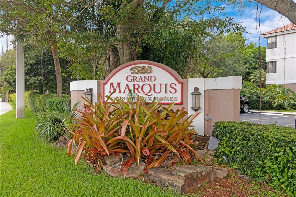 **RARELY AVAILABLE**PREMIUM GRAND MARQUIS GATED COMMUNITY LOCATED IN THE HEART OF PLANTATION**SELLERS LOSS BUYER'S GAIN**SELLER PAYING FOR NEW HURRICANE IMPACT WINDOWS AND DOORS**NEW ROOF**NEW POOL/HOT TUB REFINISHING**NEW BLACKTOP PARKING LOT**BUYERS GETS TO ENJOY ALL THE NEW UPGRADES AT NO SPECIAL ASSESMENT FOR YEARS TO COME**TRUE PRIDE OF OWNERSHIP**THIS 2 BEDROOM 2 BATH CONDO HAS BEEN BEAUTIFULLY MAINTAINED WITH PEACEFUL WATER VIEWS FROM YOUR INCLOSED SCREENED PATIO**WASHER & DRYER IN UNIT**SIT AND RELAX ENJOYING  ALL AMENTIES*POOL*HOTUB*GYM*TENNIS*BASKETBALL COURT*PICINIC AND BBQ AREA*2 ASSIGNED PARKING SPACES*PETS WELCOME**EASY APPROVAL**A MUST SEE**