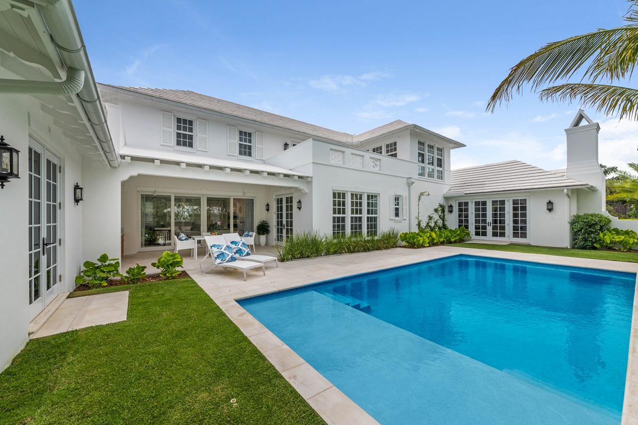 You can revel in this Eccelstone Signature Home! 4 bedroom, 5.5 bath West Indies style new home on a quiet beach access street. Situated on a private oversized lot, the exceptional attention to quality detail throughout include: family room with beamed ceilings, stone and wood floors, gourmet kitchen, marble baths, deep moldings, and high ceilings. Ideal for entertaining with gracious indoor/outdoor spaces and meticulous landscaping, fireplace, and courtyard pool. Short walk to the best beaches on the island.