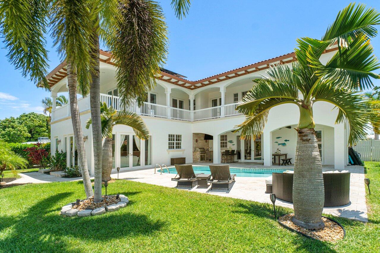 Built in 2008 this majestic Custom Estate Home is located the heart of the family friendly community of North Palm Beach. 90' of protected deep water frontage, 16k lift, no fixed bridges, beautiful boating to the Palm Beach Inlet, waterfront restaurants & parks. 4 Br, 4 Ba, oversized 2 car garage, large open Loft area, oversized Master Bedroom w/vaulted ceilings and an amazing view from inside and from the rear wrap around Terrace, accessible from several bedrooms. Central Chefs Kitchen offers great space for entertaining family & friends, Wet Bar, Butlers Pantry, SS Appliances, gas stove, spacious countertops. Impact windows/doors, whole house Electric Energy Efficient Solar, beautiful outdoor entertaining pool area, builtin BBQ Grill, marble patio decking, large fenced yard.