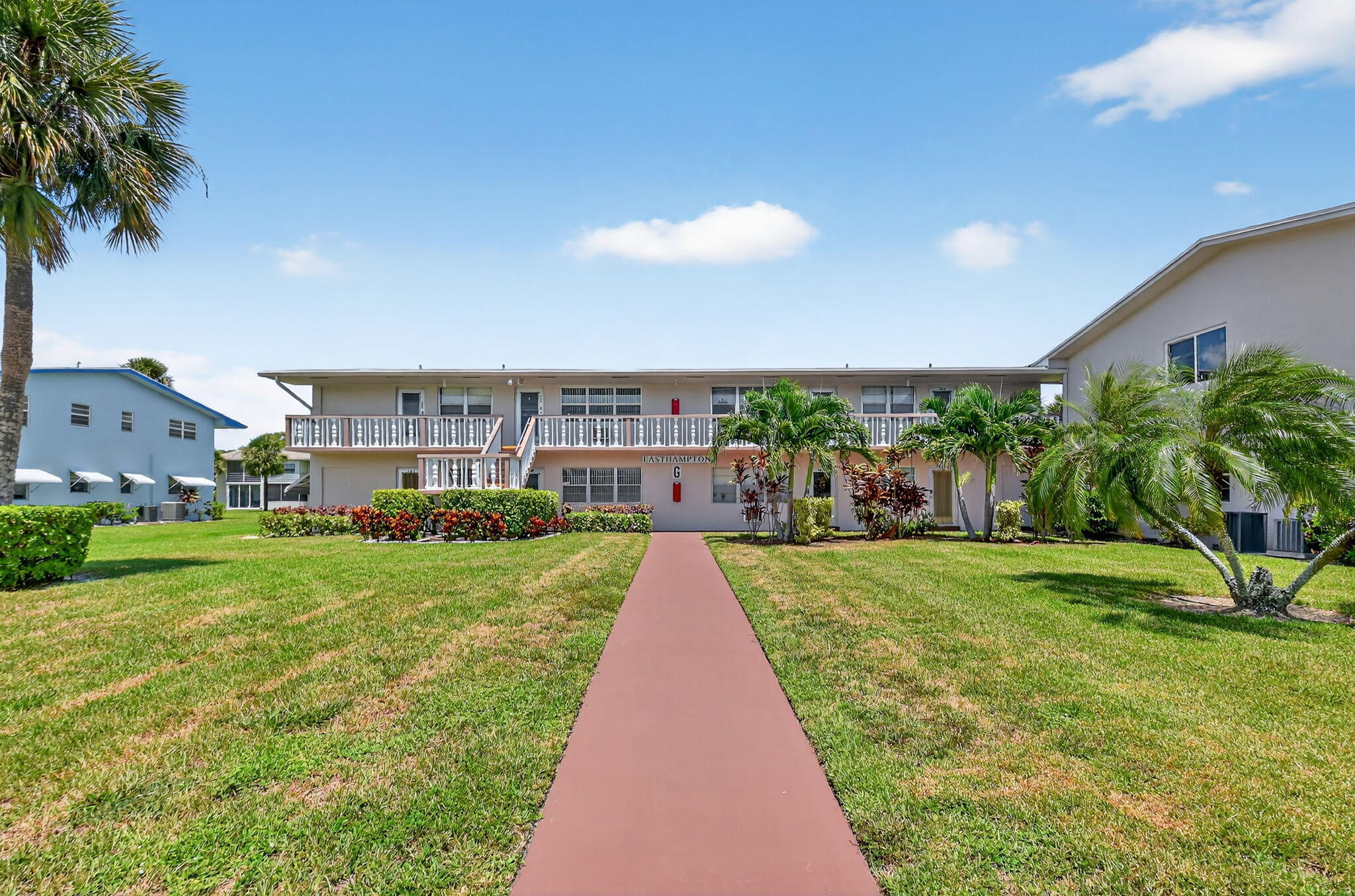 DON'T MISS OUT ON THIS VERY CLEAN LIGHT AND BRIGHT FRESHLY PAINTED 2 BED, 1 BATH UNIT ON THE SECOND FLOOR. PARTIALLY FURNISHED. FANTASTIC LOCATION CLOSE TO THE CLUBHOUSE AND THE HAVERHILL GATE. WELL MANAGED ASSOCIATION. 5 YR OLD ROOF AND NO ASSESSMENTS.RELAX ON THE ASSOCIATION'S PATIO AND ENJOY THE NATURE THAT SURROUNDS YOU. Roomy closets (one walk-in), screened-in lanai, laundry room, assigned parking spot plus visitor parking available; local bus for errands/shopping both within & outside the village. OME AND ENJOY RESORT STYLE LIVING IN THIS GATED COMMUNITY FOR ADULTS 55+ CLUBHOUSE features a theater, indoor pool, card room, community/party room, billiard room ,shuffle board ,tennis , pickleball ,bocce and two outdoor pools. Numerous heated outdoor pools throughout the community.   Indoor pool, card room, community/party room, billiard room ,shuffle board ,tennis , pickqleball ,bocce and two outdoor pools. Numerous heated outdoor pools throughout the community. Separate fitness center with gym , outdoor heated pool and a resistance pool. Two guarded gates and 24 hour roving security patrol. GREAT LOCATION: close to shops, restaurants, PBI airport and beaches.