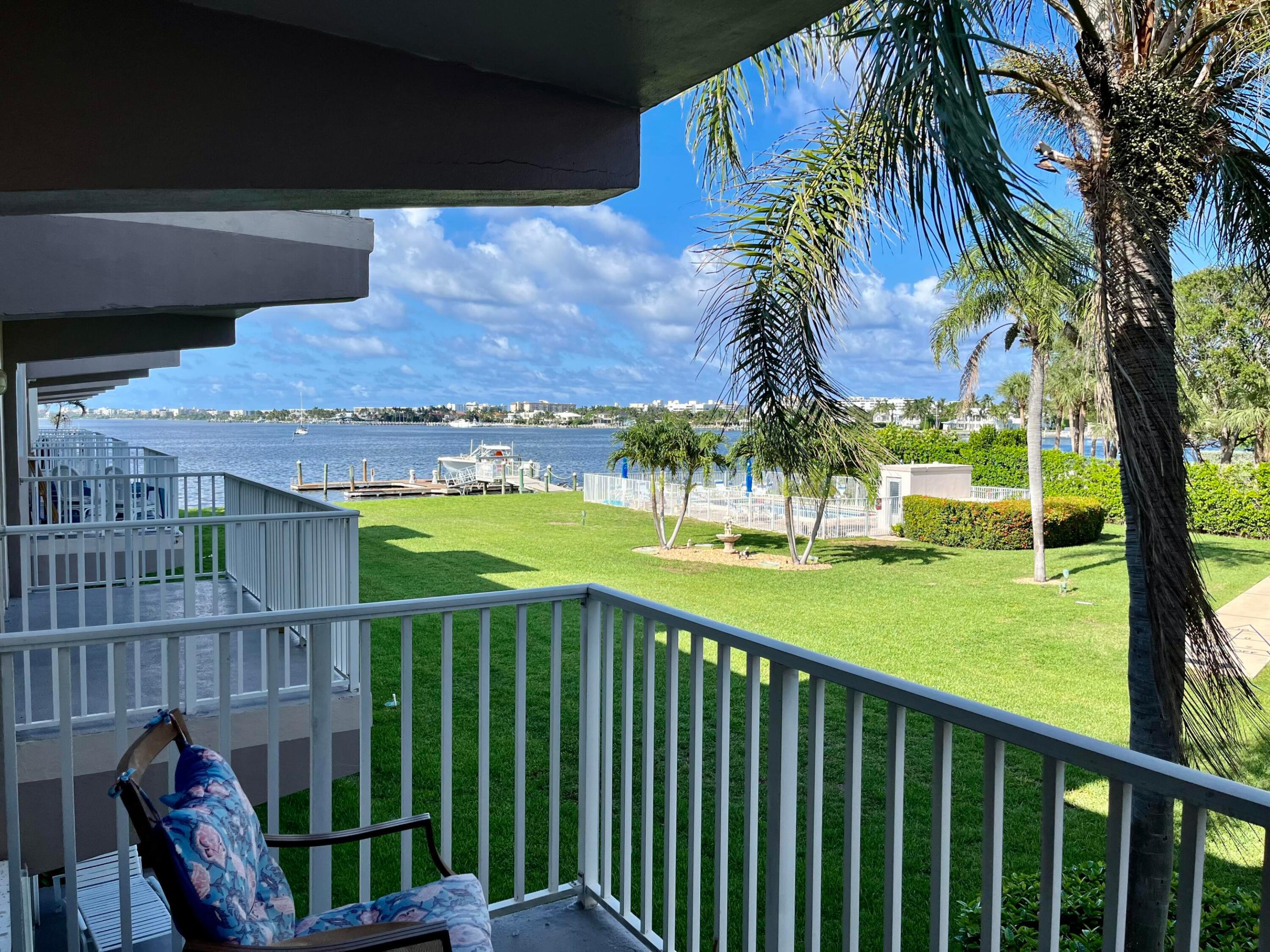 Waterfront Condo with Stunning Views - Fully Renovated! Discover this exceptional residence overlooking Lantana Cove, offering breathtaking Intracoastal Waterway views from your private balcony. Enjoy water views the moment you arrive, with a welcoming setting right at your front door. This fully renovated condo features modern finishes, an updated interior, and a bright, open feel—ready for immediate enjoyment as a primary residence, seasonal getaway, or investment property. Ideally located directly across from the famous Old Key Lime House and Kona Bay Café, and just over the bridge from the beach, Dune Deck Café, and other local favorites. Enjoy the convenience of being within walking distance to the beach, fishing pier, and nearby nature preserve.   Island Towers offers a beautifully maintained pool and grounds, along with front-row seats to the spectacular Fourth of July fireworks. A rare opportunity combining location, views, and turnkey living—don't miss your chance to own a piece of waterfront paradise.