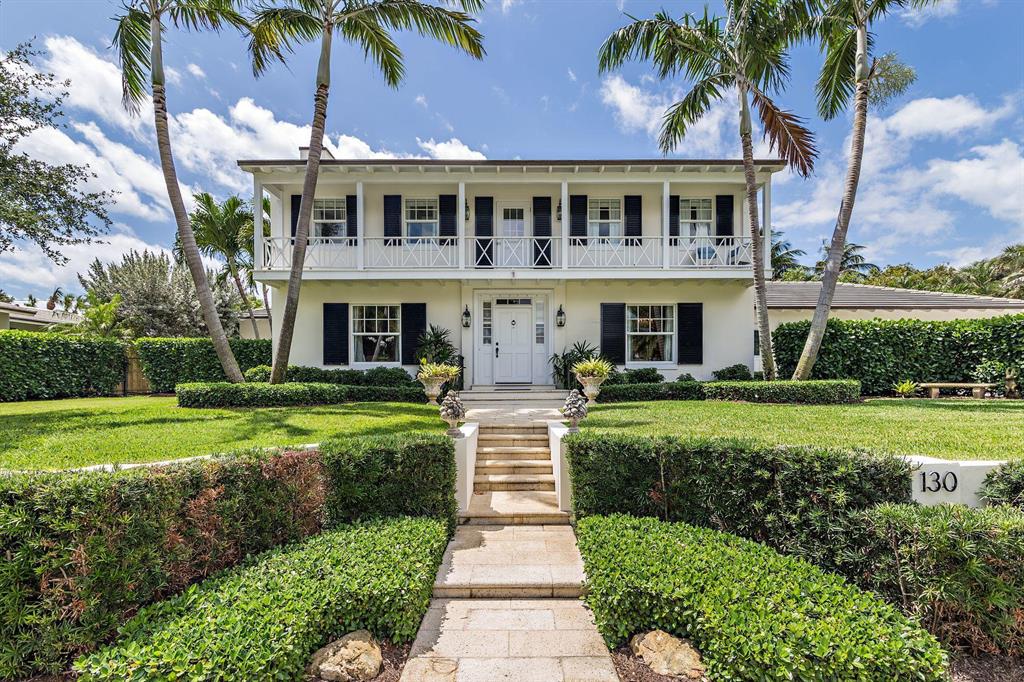 First time on the market since its conception in 1958, this very special, one of a kind, 21,000 sq. ft lot accompanied with a stunning Monterey style 5,439 sq. ft home is available for purchase. Magnificently maintained, recently renovated and added on to, this home now boasts 4 bedrooms, 3 full and 2 half  bathrooms, a formal living room, a formal dining room, an oversized open concept kitchen with adjacent family room, a separate office, a large laundry/ mudroom, 2 car garage and much more. With a first-floor master bedroom overlooking the tropical backyard and swimming pool, this home and its configuration is literally perfect for any home buyer.  In 2004, the current homeowners installed an elevator allowing access from the living room to the three upstairs bedrooms. In 2014, this home underwent a massive renovation/ addition adding what is now the kitchen, family room, butler's pantry, master bedroom, his & her closets, master bathroom as well as outside loggias. In 2020, the "she-shed" guest cottage was added. Located in the South Olive Elementary School district, close to area beaches, fine dining, fabulous shopping, I-95, PBI Airport and Flagler Drive bike trail.