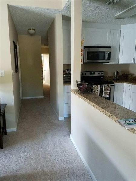 Twin Single Family Home Centrally located to highway and main roads in quite town of Deerfield Beach. Please bring offers as this property won't last.