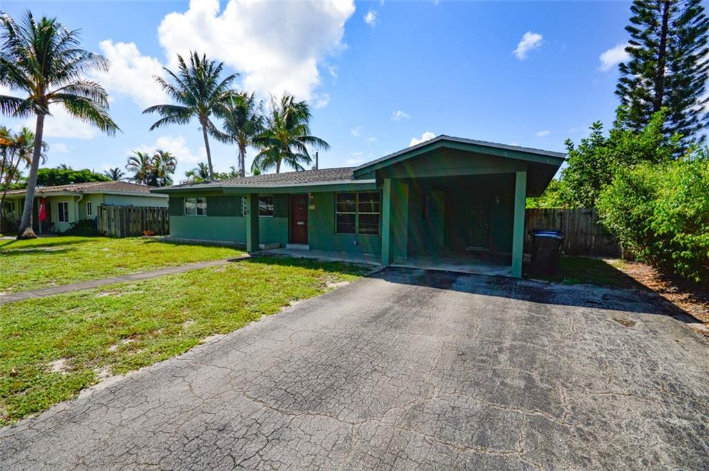 Opportunity to own a home in the wonderful neighborhood of Mary-Knoll! This home has so much potential with it's open living areas and a nice florida room. Kitchen faces the backyard and is open to the family areas as well. You will also find a separate laundry room and a screened in patio. Home features terrazzo flooring and is just looking for a new owner.