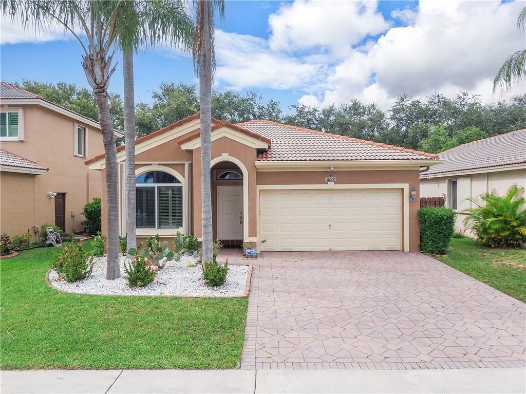 WOW! What an amazing location ~ across the street from Sabal Pines Park with many youth sports & community festivals, walking/biking distance to Winston Park Elem. School ~ and 2 blocks from the Coconut Creek Promenade. This one story 3 bed 2 bath 2 car garage home had the interior totally rebuilt down to the 'studs' in 2018/2019. Everything inside is 4-4.5 years old. Water heater, plumbing, cabinets, drywall, insulation, wood look tile, lighting, vanities, and MORE all 2019. All work done w/City permits & current owner has all the paperwork & photos. Screened patio is great to BBQ & backyard great for corn hole, playing catch & kicking a soccer ball! Community amenities: 2 pools, party room/small clubhouse & playground area. Cable & trash incl w/HOA fee. Leasing allowed.