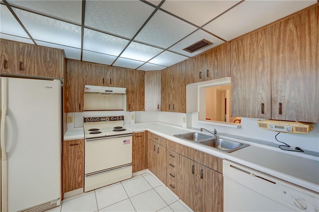 AMAZING OPPORTUNITY TO OWN THIS GROUND FLOOR 2BEDROOM/2BATH WITH PARTIAL GOLF/LAKE VIEW. CERAMIC AND CARPET AROUND. CONDO BEING SOLD AS-IS. CONDO IS IN GOOD SHAPE. NEEDS SOME PERSONAL TOUCH AND SOME UPDATE. PRICED FOR A QUICK SALE!. ASSOC REQUIRES 20% DOWN & 1 OCCUP 55+ VACANT/CLICK ON SHOWING ASSIST