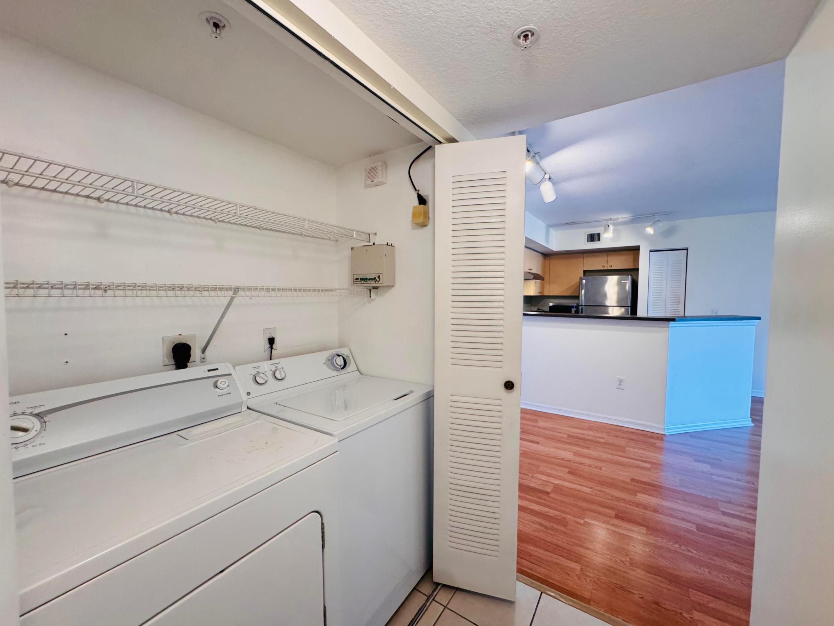 Spacious and beautifully maintained 2-bedroom, 2-bathroom apartment located in the highly desirable gated community of Emerald Isles. This bright and inviting unit features countertops in both the kitchen and bathroom, stainless steel appliances, ample cabinet storage, and wood-look laminate flooring throughout the bedrooms. The primary bedroom offers a large walk-in closet, and the convenience of an in-unit laundry room adds to the home's appeal. Residents enjoy access to outstanding community amenities, including a resort-style swimming pool and more. Ideally situated just minutes from CityPlace, downtown West Palm Beach, shopping, dining, and major highways.