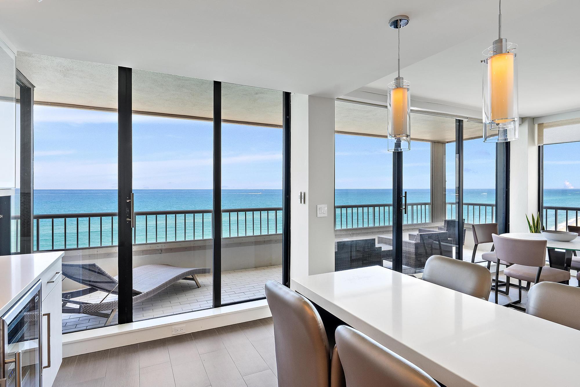 Sand Seeker Directly on the sand. Spectacular views from every room. Boutique, pet-friendly living with the convenience of an in-unit washer and dryer. Welcome to Capri, one of Singer Island's most exclusive beachfront communities. This exceptional residence occupies the entire south side of the building, offering unobstructed panoramic views of both the Atlantic Ocean and the Intracoastal Waterway from nearly every room. With only two residences per floor and just 28 residences in the building, Capri offers the privacy and tranquility rarely found in oceanfront living. Completely renovated in a sophisticated contemporary style, the residence features an open-concept floor plan with wood-look porcelain tile flooring throughout, a beautifully redesigned kitchen with Quartz countertops,  custom cabinetry, glass tile backsplash, and Bosch appliances. Every bathroom has been thoughtfully updated, and the home is offered fully furnished, creating a seamless move-in-ready opportunity.  Parking: Assigned covered garage parking space #39  (Building Space B-8) Rental Restrictions  Ownership is required for a minimum of 3 years before leasing is permitted. No short-term rentals. Minimum lease term is 1 year. Maximum of two (2) one-year leases within any five years.