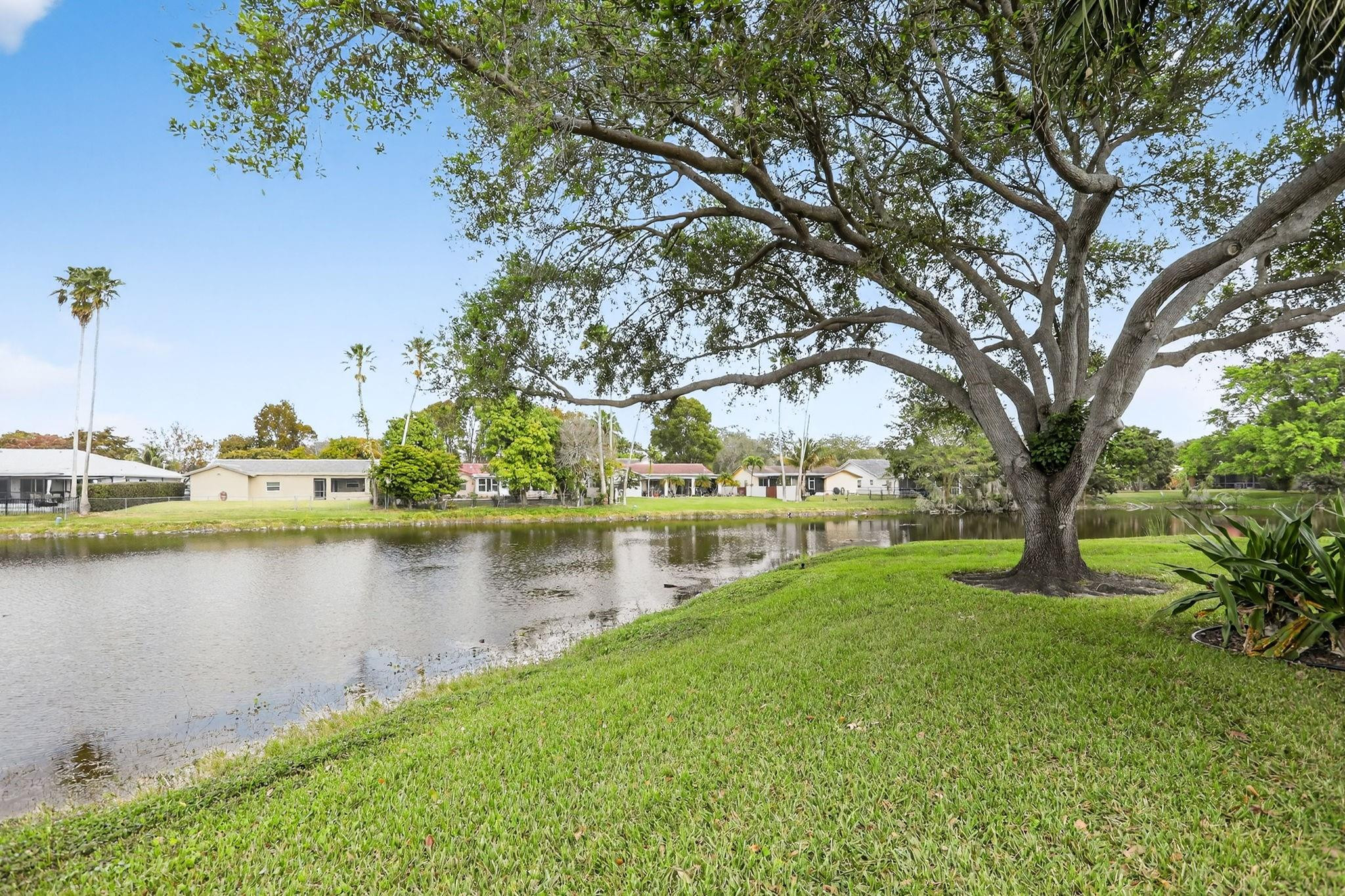 Move right into this beautiful 2-bedroom, 2-bath Corner Unit featuring a Serene WATER VIEW and a Prime Location near the elevator. Ideal to live in and great for investors as it can be RENTED right away. Enjoy the convenience of an in-unit washer and dryer plus additional storage located right outside of unit. Recent upgrades include luxury vinyl flooring throughout, a new refrigerator, and new toilets, along with a newer roof. Centrally located in desirable Coral Springs, close to shopping, dining, entertainment, and the Sawgrass Expressway. Discover this hidden gem in a well-maintained private community. Best price in Waters Edge!
