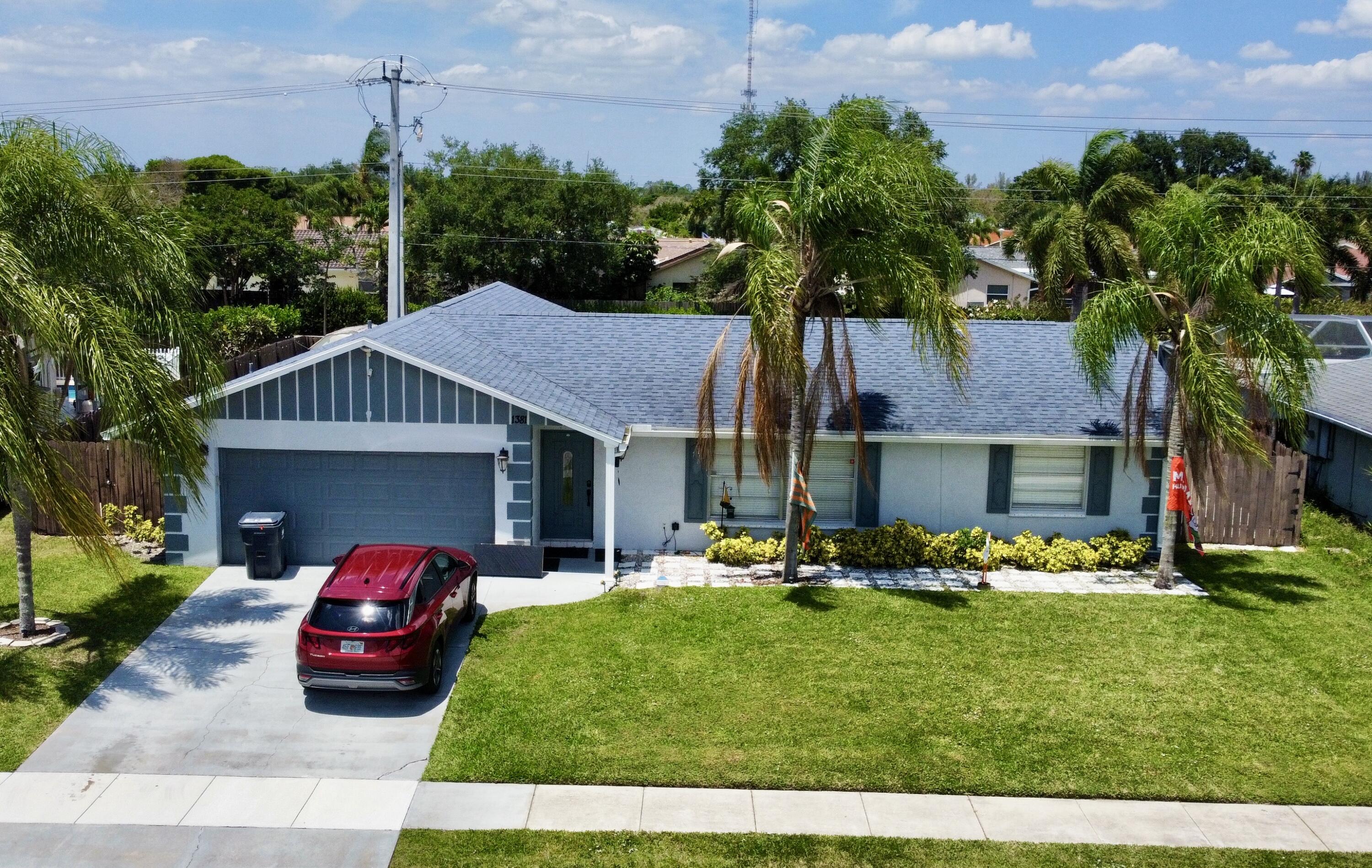 Welcome to this updated 4-bedroom, 2-bath home in the heart of Wellington, with no HOA. This home features a desirable split floor plan with a spacious primary suite, walk-in closet, and a fully renovated main bathroom 2024. The secondary bathroom was updated in 2023. The fully remodeled kitchen serves as the centerpiece of the home and a custom-built entertainment wall with an integrated sound system. Major upgrades, including French doors, exterior paint, a new A/C condenser, fully serviced indoor air handler, and complete A/C duct replacement in 2025. New pool pump (2025) and Roof is 2018. Private backyard featuring a pool, built-in fire pit, and designated boat or RV parking.Property is tenant occupied until mid-June. Please do not disturb tenants. Showings by appointment