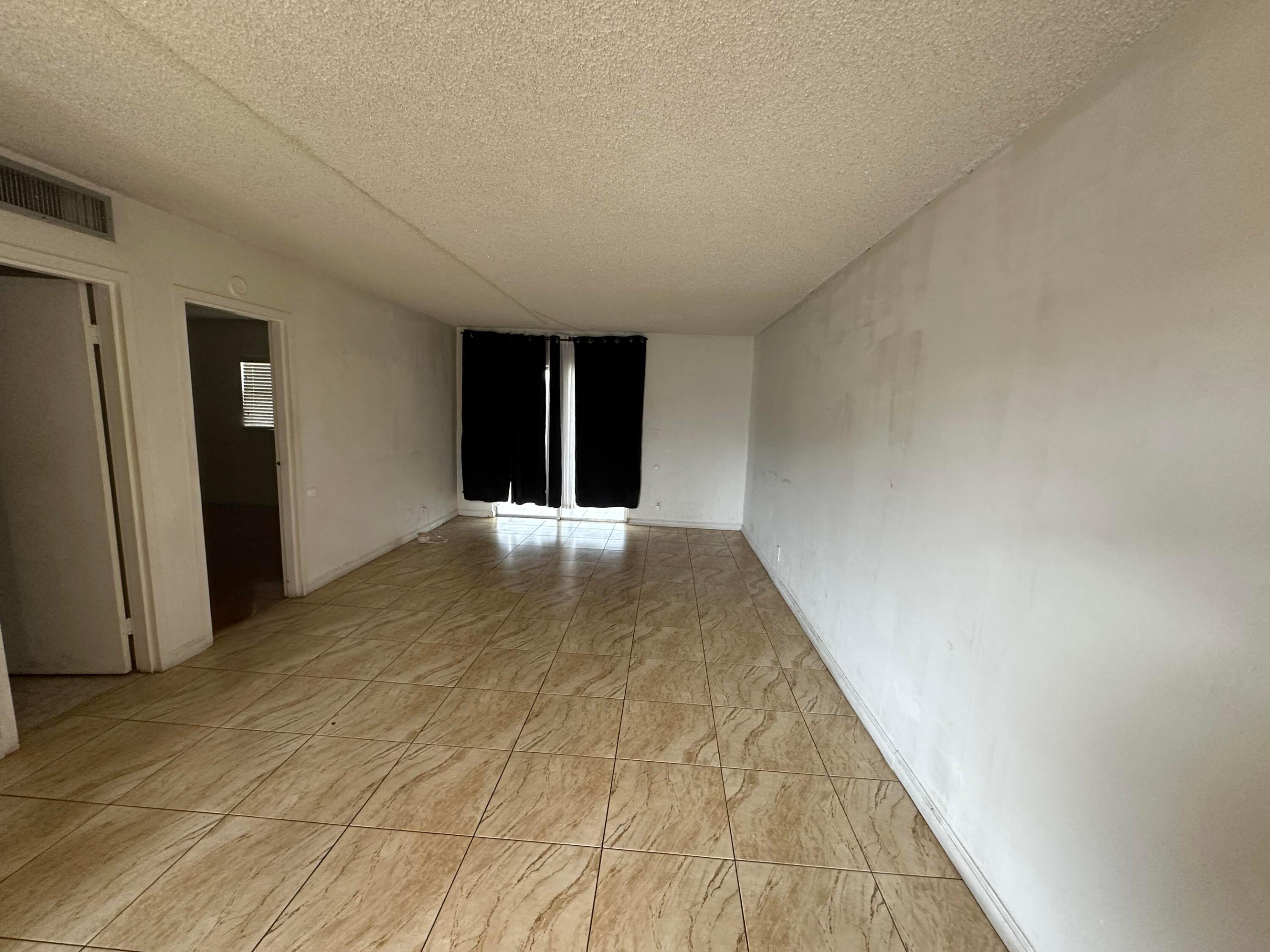 GARDENS AT LAUDERHILL CONDO - Residential