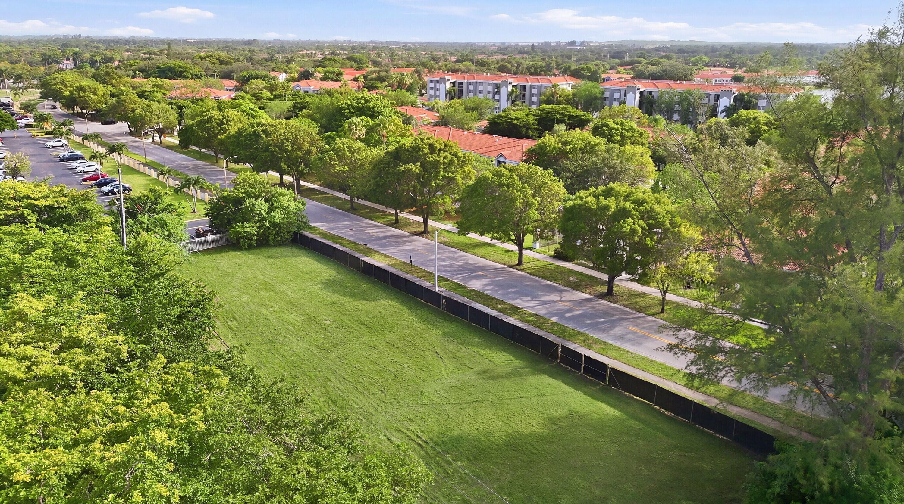 Exceptional opportunity to acquire one of the few remaining entitled vacant land sites in the heart of Miramar. Situated in one of Broward County's most desirable development corridors, this premier parcel includes site plan entitlements for six townhomes, making it an outstanding opportunity for builders, developers, and investors seeking their next residential project. Ideally located just minutes from Florida's Turnpike and major highways, the property offers convenient access to Miramar Town Center, Pembroke Lakes Mall, The Shops at Pembroke Gardens, Memorial Hospital Miramar, Hard Rock Stadium, CB Smith Park, and a prestigious selection of shopping, dining, entertainment, and everyday conveniences. Adding to its appeal, the property is just minutes from the highly anticipated Miramar Cove mixed-use development, a landmark destination planned to feature luxury residences, boutique retail stores, signature restaurants, office space, parks, and entertainment further strengthening the area's long-term demand and investment appeal. Opportunities to acquire entitled residential development land in this location are increasingly limited, making this an exceptional offering in one of South Florida's most sought-after markets. Buyer to verify zoning, site plan entitlements, utilities, and development requirements.