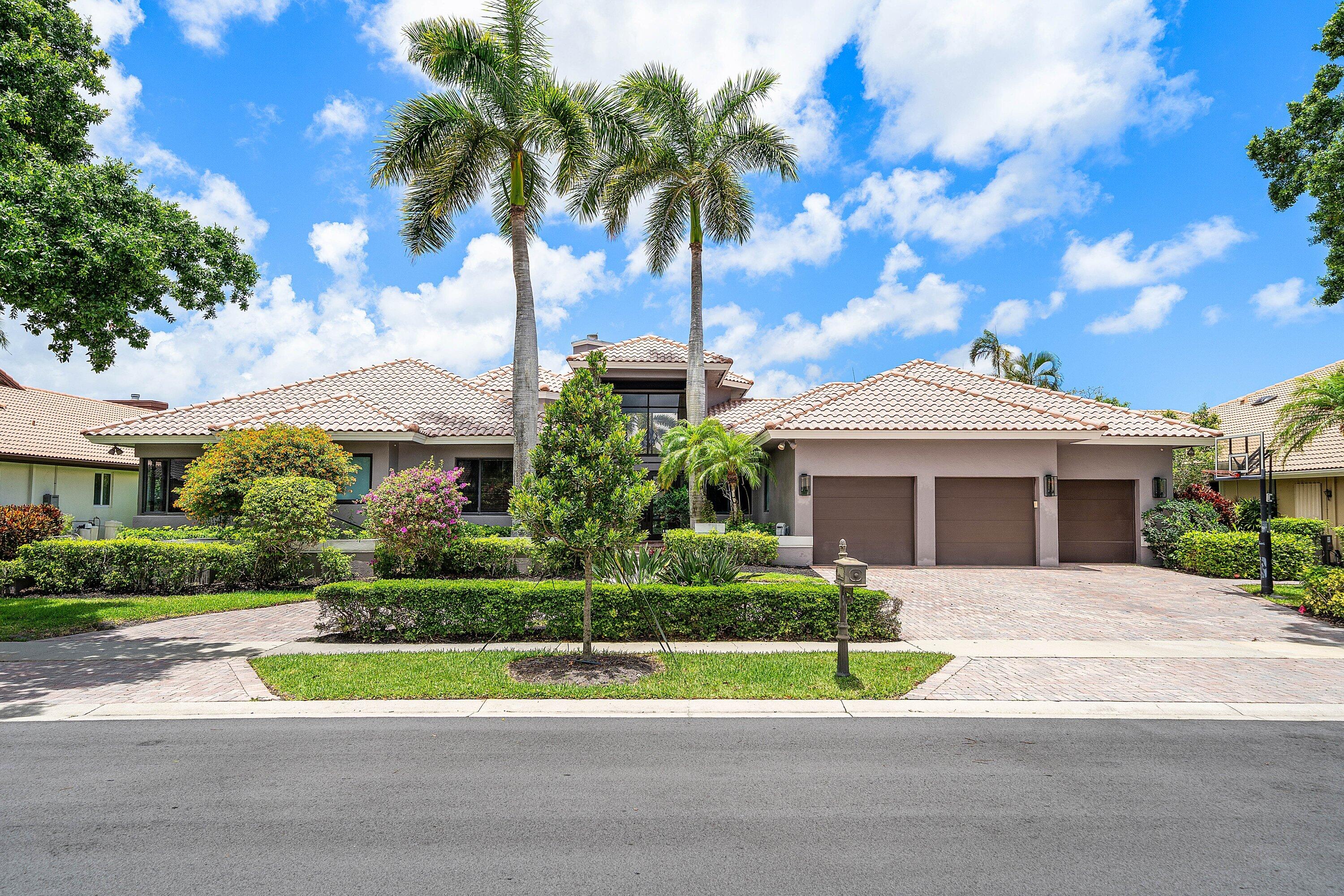 Gorgeous 5 BD, 4.5 BA, 3854 SF residence offering exceptional upgrades, refined finishes, and inviting indoor-outdoor living. Soaring palatial ceilings and oversized windows define the living room, allowing natural Florida sunlight to pour through the home. Thoughtfully designed for entertaining, the residence features a fully equipped bar, wine cellar, oversized gourmet kitchen, and a resort-style backyard. Outdoor living is fully equipped with a pool and spa and very generous patio space. The primary suite provides a peaceful private retreat, balancing luxury, comfort, and relaxation.  Partial impact windows, impact front door, gas wolf stove top, upgrades galore on an oversized lot.
