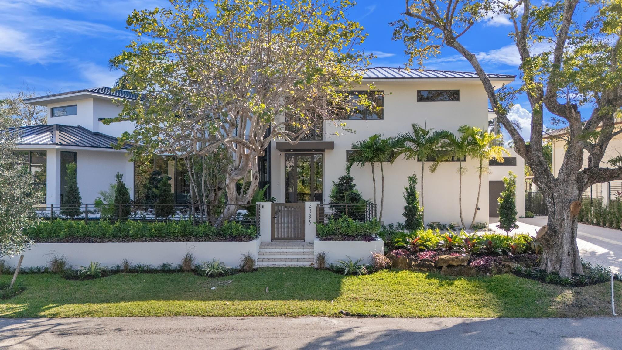 Just Completed This Captivating New Estate On Famed Intracoastal Drive By Double P Construction. An Architectural Masterpiece Merging Innovation w/Timeless Refinement, Where Every Facet Embodies Visionary Artistry & Engineering Brilliance. An Interior That Offers Bold Lines & Seamless Volumes. Two Story Great Room w/Fireplace & Club Room w/Bar. Custom Kitchen Brings Elevated Italian Luxury. Primary w/Private Baths & Luxury Closets, Plus Six More EnSuite, Two 1st Floor w/Separate Entrances. Take The Glass Elevator to The 3rd Floor Playroom & Enjoy Ocean Breezes, Intracoastal Waterway & Birch State Park From Your Covered Patio. Large Walled Lot, Electric Gate, 3 Lift-Compatible Garage Stalls, Heated Pool, Generator.