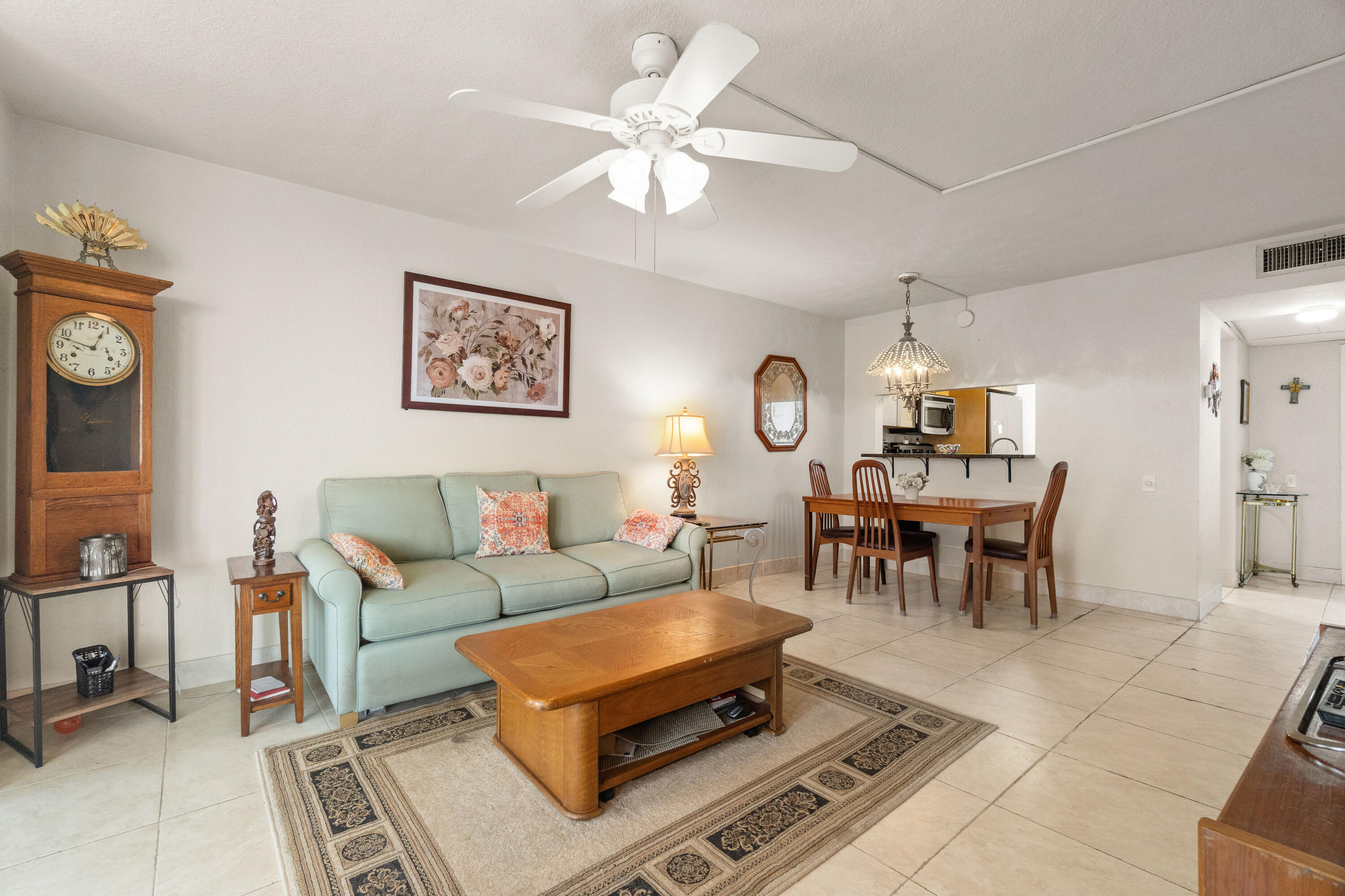 Beautifully maintained and move-in ready 1BR/1.5BA waterfront condo in a desirable 55+ community! Enjoy peaceful water views from this bright and inviting home featuring tile flooring throughout, impact windows and doors for added security and energy efficiency, and a brand-new 2025 roof. The updated kitchen offers stainless steel appliances and a brand-new refrigerator, perfect for everyday living and entertaining. Spacious primary suite with ample closet space and a convenient half bath for guests. Resort-style community amenities, low-maintenance living, and an unbeatable location close to shopping, dining, beaches, golf, and major highways. A perfect full-time residence, seasonal retreat, or investment opportunity in sunny South Florida!