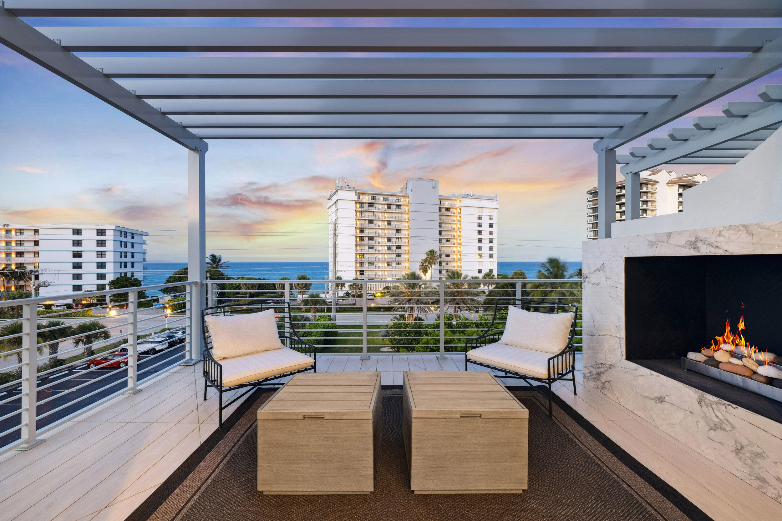 Welcome to 461 Venus Drive, the Crown Jewel of Juno Beach. Discover the ultimate in luxury coastal living, arguably the finest beach home in all of Juno Beach. Just completed in late December 2024, this stunning three-story townhome offers over 4,200 square feet of thoughtfully designed living space, top-of-the-line finishes, and unmatched ocean views from nearly every east- and north-facing window. A private elevator services all three levels, providing effortless access and enhancing the home's comfort and convenience. Juno Beach is a hidden gem, a pristine coastal town known for its natural sand dunes, nature preserves, and Old Florida charm. Located within walking distance to top-rated restaurants, boutique shops, and cozy coffee spots, the neighborhood is not only beautiful but also consistently ranked as one of the safest places to live in Florida. And best of all, there's no HOA.

The first floor offers a flexible layout that can function as a cabana, guest suite, or home office. It features custom built-ins with refrigerated drawers and connects through pocket doors to a bedroom and full bath that also serves as a cabana bath. Just outside, your private oasis awaits with a saltwater pool, white marble pavers, a covered loggia with a fully equipped summer kitchen, and cool ocean breezes. A full-house generator provides peace of mind and uninterrupted comfort year-round. An elevator conveniently connects all floors, making every level of this home easily accessible.

On the second floor, the open-concept living space is bright and elegant with massive 48"x48" porcelain flooring throughout. The living, dining, and kitchen areas are all part of one seamless space centered around a stunning 13-foot island with quartz countertops. The kitchen is fully outfitted with a WOLF gas range, Miele appliances, a built-in espresso machine, and a walk-in pantry. Just off the main living area, you'll find an oversized terrace perfect for lounging or entertaining. Down the hall, there's a designated wine room, a spacious laundry room, and a beautifully finished guest suite with two large walk-in closets.

As you reach the third floor, floor-to-ceiling windows at the top of the stairs flood the space with natural light and showcase spectacular views of the Atlantic Ocean. The oversized primary suite features a cozy sitting area, a private terrace with panoramic ocean views where you can watch the sunrise from your bed, and a gas fireplace for those cold front chilly Florida nights. The spa-like primary bathroom includes a long hallway, his and hers closets, custom vanity, dual toilets, dual vanities, a dedicated makeup station, and a massive walk-in shower with two showerheads and a gorgeous quartzite accent wall overlooking the freestanding soaking tub.

Across the hallway is another spacious en-suite bedroom, complete with a wet bar, offering comfort and privacy for guests.

Car lovers will appreciate the oversized tandem garage that can accommodate up to three cars or four smaller ones, like Porsche 911s. And best of all, you're directly across the street from beach access.

This is truly a once-in-a-lifetime opportunity to own one of Juno Beach's most luxurious new homes, just steps from the sand. No HOA, brand-new construction, a private elevator, and surrounded by nature and walkable charm. Don't miss your chance to live the ultimate beach lifestyle at 461 Venus​​‌​​​​‌​‌​​​‌‌​​​‌‌‌​​‌​​‌‌​​​​ Drive.