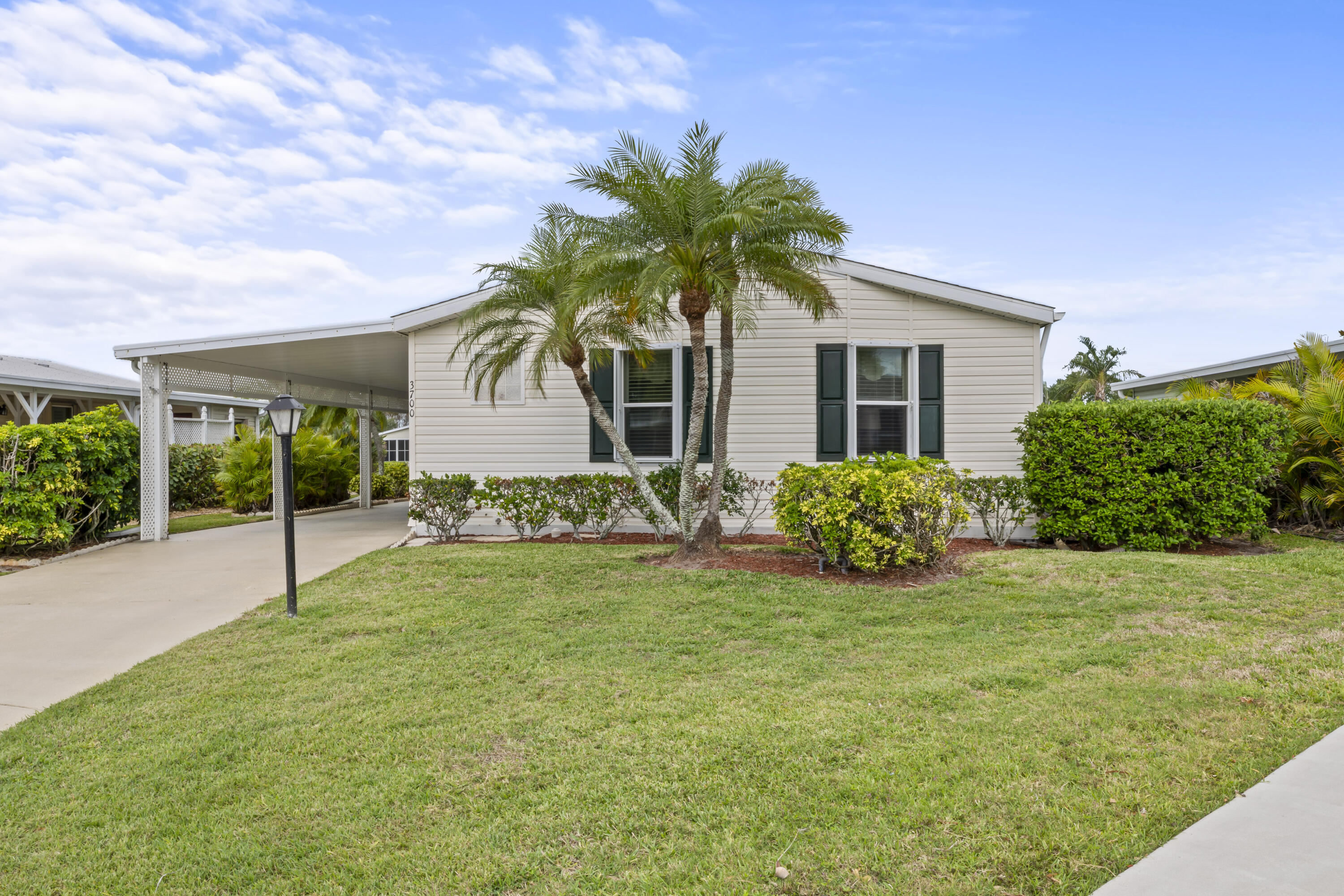 SELLER IS PUTTING A NEW ROOF ON!!!  This well maintained home is being sold furnished. Spacious and inviting you are going to feel right at home.Enjoy your morning coffee in the relaxing Florida room while taking in the view of the lake. Accordian shutters throughout. The Islander model features 2 bedrooms , 2 baths with a den/office. Located in the desirable 55+ resort style community Savanna Club. This house was built for entertaining. It features a large kitchen island and an open floor plan. Large closets and tons of storage space including a separate shed. Savanna Club offers amenities that include a 18-hole golf course,10,000 sq ft Performing Arts Center,Tennis & Fitness Center,Billiard Room; Bocce Ball; Cafe/Restaurant; AND much more... Savanna Club offers amenities that include a 18-hole golf course,10,000 sq ft Performing Arts Center,Tennis & Fitness Center,Billiard Room; Bocce Ball; Cafe/Restaurant;  Community Room; Pickleball, Pool; Putting Green; Sauna; Shuffleboard Court; and much more.