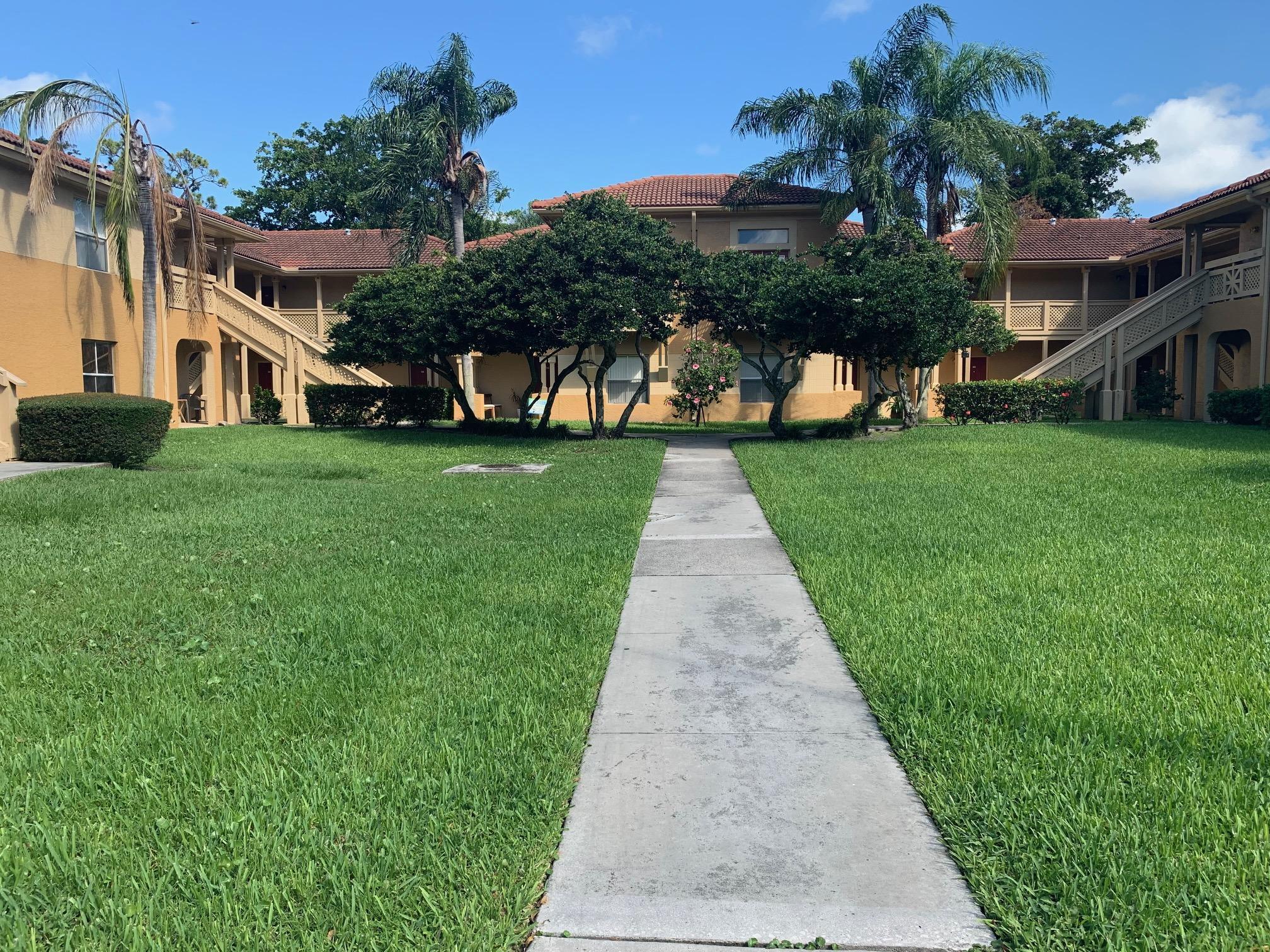 2/2 first floor condo in a central West Palm Beach gated community. Unit features new wood look vinyl flooring, washer dryer in unit, white kitchen, walk-in closets, and screened patio. Kitchen has a large pantry, ample storage and counter space, and bar seating. Community offers clubhouse, tennis courts, and community pool.