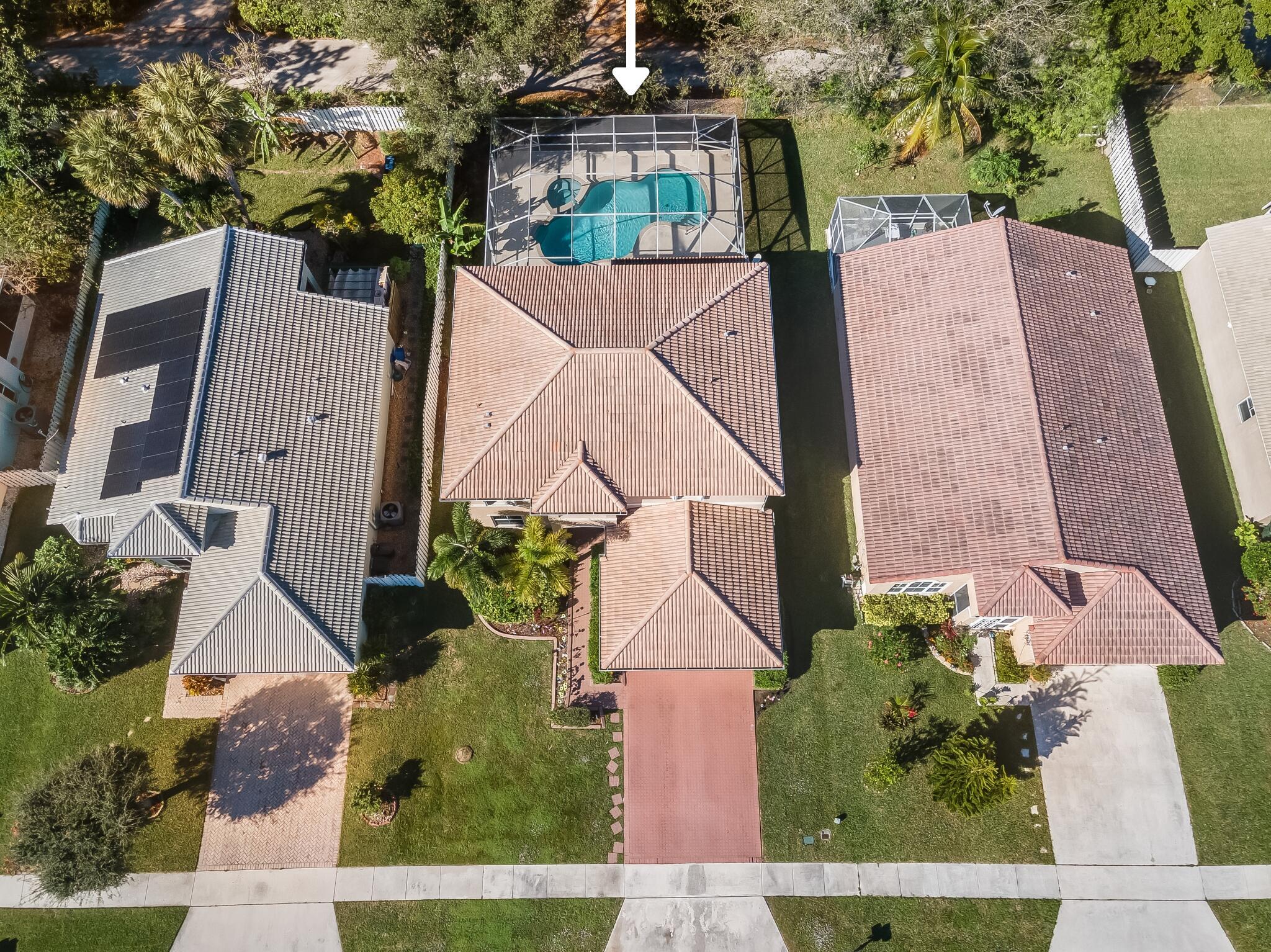 Spacious 5-bedroom, 3-bathroom pool home in the sought-after Dillman Farms community. This two-story residence offers 2,372 living square feet with a functional floor plan designed for comfortable living and entertaining. Features include ceramic tile flooring, generous living areas, a spacious kitchen, and abundant natural light throughout. Enjoy the Florida lifestyle in the private backyard featuring an in-ground pool. Constructed with CBS construction and a concrete tile roof, this home offers both durability and convenience. Ideally located near shopping, dining, parks, schools, and major roadways. A great opportunity to own a spacious home in an established Greenacres neighborhood.