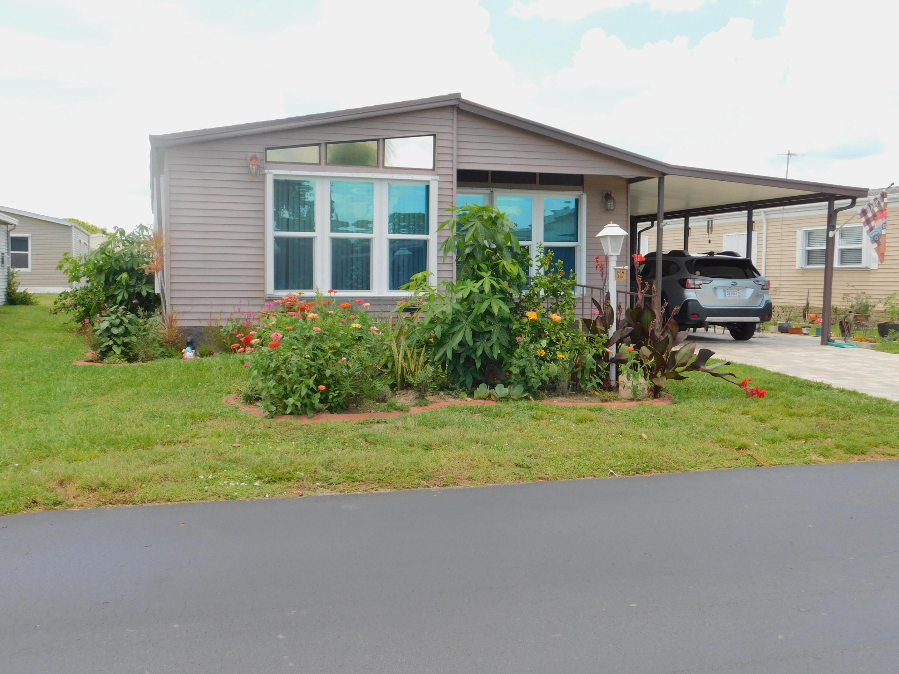 All Updated and ready to move into. NO LOT LEASE as it comes with a "Share Certificate". Newer Roof, Air Cond. and fans, newer verticals, Newer floor, Newer Plumbing in & out. Newer Vapor barrier, Newer driveway and windows, Newer paint throughout, countertops updated and cabinets painted, house painted outside, Newer windows in sunroom, hurricane shutters and mini split. Great 2 bedroom, 2 bath home with master bath updated and all new appliances.  Buyer approval needed.