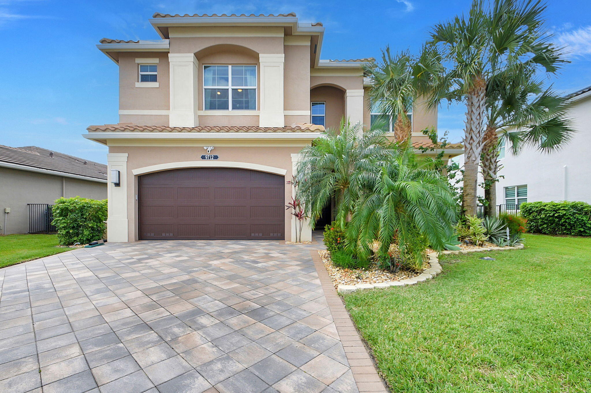 Dakota is one of the most sought after manned-gated communities in West Delray and Sienna Grande is one of the biggest floor plans with a saltwater pool and lake view offered! 6 bedroom and 5 full baths can accommodate just about any living situation! Tons of upgrades and custom landscaping, including a putting green and full home generator. Kitchen features upgraded white shaker cabinets, quartz countertops, upgraded gourmet ss appliances, with expanded pantry,    huge island and large dining area. Ample sized living room with built-ins. Upstairs has a huge loft and the primary has custom built-in closets. Recessed lighting in all rooms and separate A/C unit garage. Dakota has resort-style amenities with a beautiful clubhouse, heated pool, kiddie pool, fitness center, pickleball, tennis,  indoor and outdoor basketball courts, playground and 24-manned security. You'll feel safe, welcomed and at home in this magnificent community!
