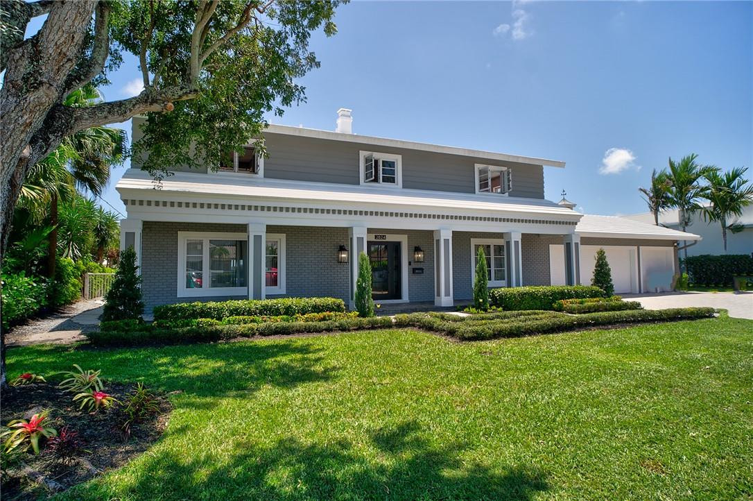 A unique opportunity to live in the only home available on Coral Ridge Country Club's widest (200ft) ocean access canal 3 lots from ICW. Newly rebuilt open concept with new impact windows & doors, huge gourmet kitchen, 4 bedrooms all en-suite with main suite having 2 vanities, 2 water closets, 2 showers and free standing tub. Full length 2nd floor terrace for sunrise/sunset views. New 100ft sea wall & new 80ft composite dock, beautiful landscaping/lighting create a seamless backyard with oversize pool. All this and a 3 car garage, bring your golf cart! Home is scheduled to be completed end of February 2022.