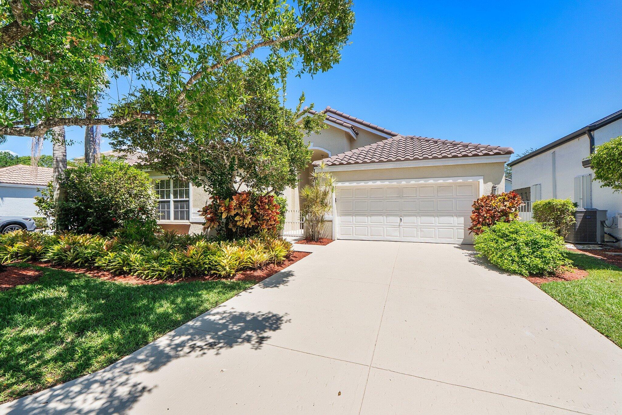 Discover exceptional oasis with total privacy in this single-story home tucked away within the gated Captiva Cay community. Ideally situated in the heart of Weston and within walking distance to Weston Town Center, this 2026 Renovated 3-bedroom, 2 full bath home offers both convenience and lifestyle. Enjoy access to highly A+ rated schools and retreat to your own private backyard oasis, complete with an oversized private patio, heated pool and jacuzzi inviting indoor/outdoor living! Rare opportunity to own in 100% maintenance free all-inclusive professional landscaping in Captiva Cay in Weston for a rarely low HOA fee protecting your property and time! Newly replaced tiled roof & 2026 renovated kitchen just some of the highlights of this clean, pristine gem. 2324 total square foot home features 3 beds/2 baths. Spacious layout provides soaring vaulted ceilings & abundant natural light complemented by tiled flooring & elegant lighting fixtures. Property enveloped by lush landscaping on a sweet tree-lined street ending in a cul-de-sac for exclusivity and privacy. Primary bedroom generously sized, w/hardwood flooring & open concept design seamlessly flowing into living areas. Lush landscaping enhance home's curb appeal. Coupled with vaulted ceilings & bright, light-filled rooms create warm & welcoming atmosphere. This sweet abode is one of a kind and rarely available. Come! See! Own!