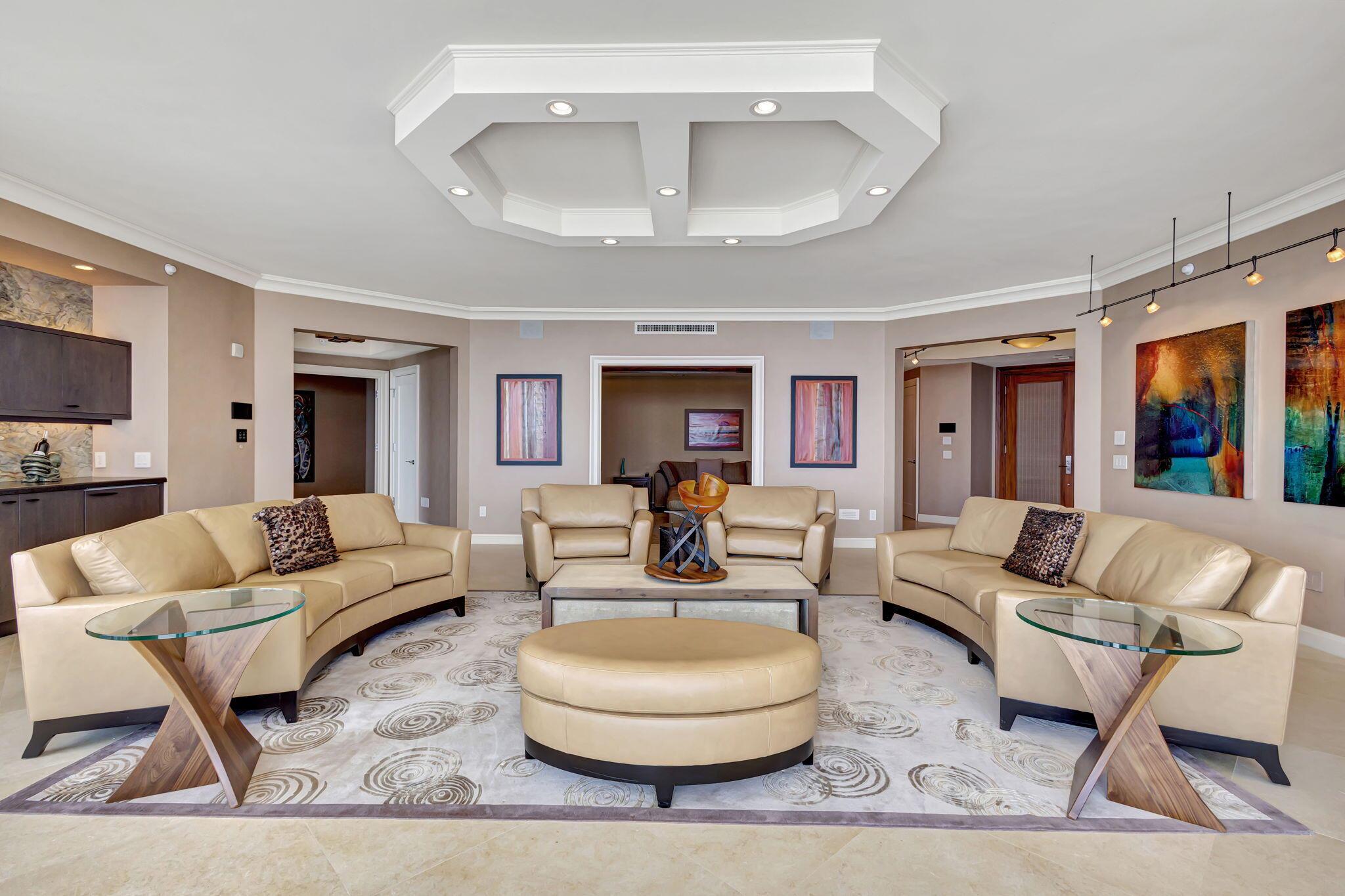 A TURN-KEY GEM. 
*DESIGNER DECORATED WITH FINE LEATHER, SOPHISTICATED TEXTILES, MODERN ART WORK, AND TOUCH SCREEN TECHNOLOGY !
*UNOBSTRUCTED VIEWS OF BOTH OCEAN AND INTRA-COASTAL
*A MASTER SUITE WITH HUGE WALKIN CLOSET, & DOUBLE VANITIES
*GAS COOKING RANGE IN A GOURMET KITCHEN WITH CUSTOM CABINETRY AND HIGH-END APPLIANCES

RITZ CARLTON RESIDENCE OFFERS TWO POOLS, DIRECT BEACH ACCESS, POOLSIDE CAFE, FABULOUS FITNESS CENTER, VALET PARKING, AND 24 HOUR CONCIERGE SERVICE.