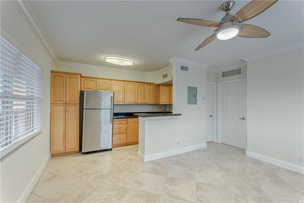 Beautiful 1 Bed/1 Bath Corner Unit with views of Holiday Park in a Boutique Building Situated in Desirable Victoria Park! Condo has tons of natural light with pool and Holiday Park views featuring crown molding, tile floors throughout, new fixtures and freshly painted. Kitchen features granite counter-tops and stainless steel appliances. Bedroom has a spacious walk-in closet with Washer/Dryer - and additional closet space with built-ins. Gated pet friendly building with low maintenance fees and private tropical pool area across the street from Holiday Park. Clean, Move-In Ready Unit in Excellent Location - Close to Las Olas, Beaches, Shopping, Restaurants and Fort Lauderdale's Finest Entertainment! Great investment opportunity - Okay to lease 1st year.