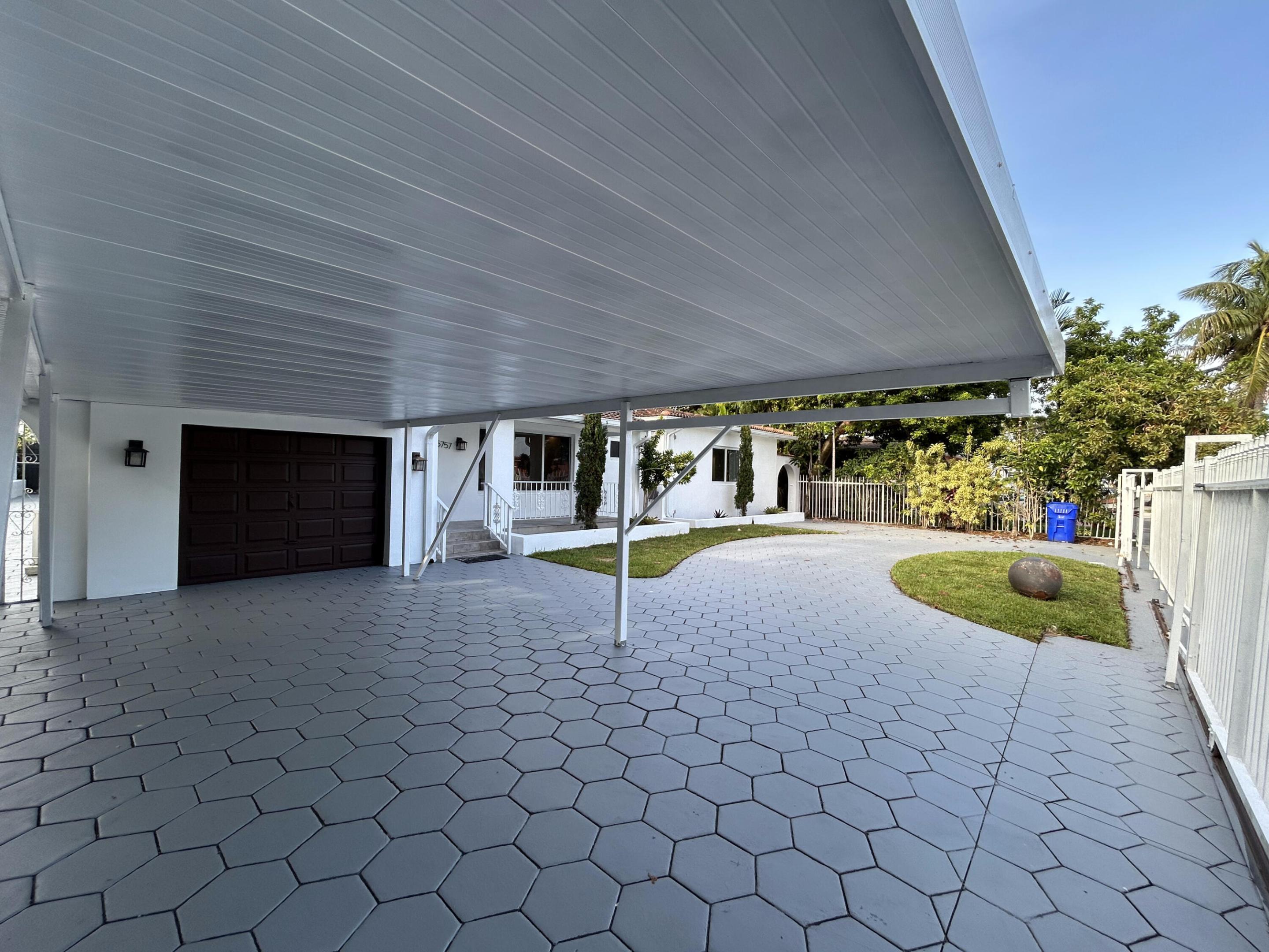 **MLS Description — 5757 SW 3rd St, Miami, FL 33144 | $1,080,000**  Exceptional opportunity in the coveted Coral Gables area! This versatile property features a **3BD/2BA main home** with a fully equipped kitchen, 1-car garage, and a pergola carport for a second vehicle. Enjoy outdoor living year-round under a beautiful **covered back patio pergola** — perfect for entertaining. A completely independent **1BD/1BA in-law suite with its own kitchen** offers ideal accommodations for extended family or rental income. Also on the property: a solid **CBS outbuilding with tile roof**, ready to be used as a workshop, studio, or storage. Live in one, rent the other — the possibilities are endless. Minutes to Miracle Mile, Coconut Grove, top-rated schools, and MIA. A true gem that won't last!.  Detached concrete block structure with barrel tile roof — a blank canvas offering endless possibilities: workshop, art studio, home gym, wine cellar, or conversion to additional living quarters.