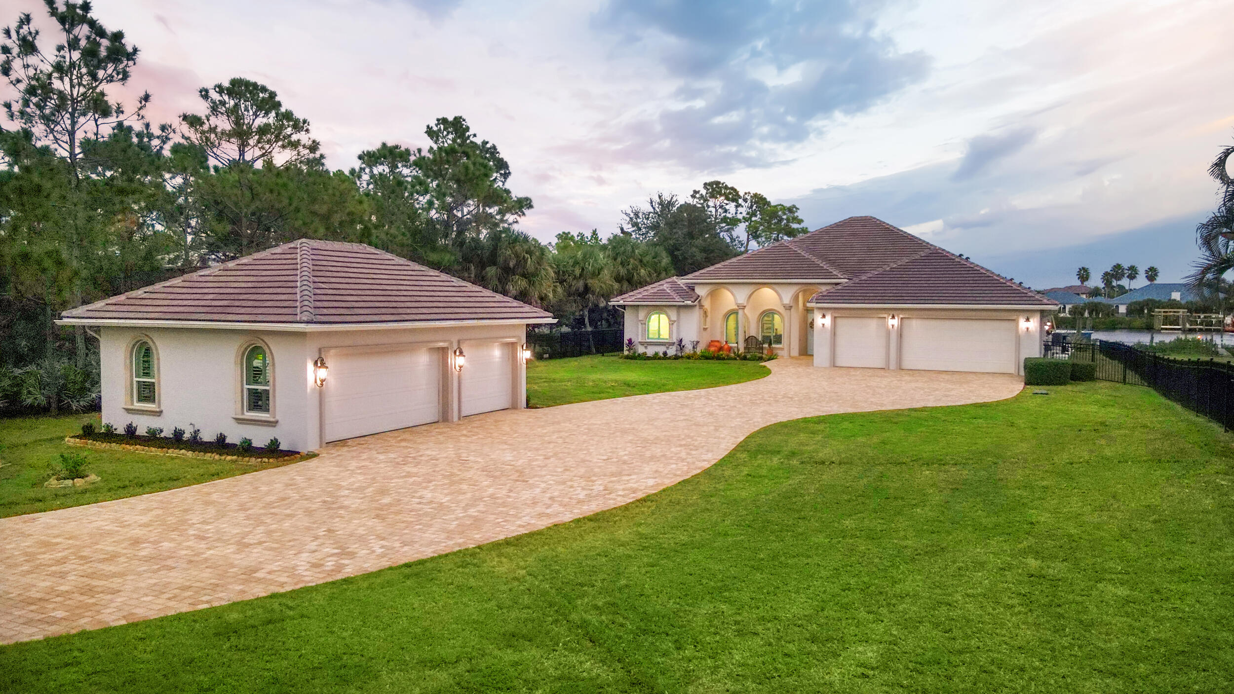 This architectural showpiece of coastal waterfront living delivers secure yacht ownership with a hurricane-hole-rated aprox 70' slip, deepwater ocean access, and over 1 acre in Vikings Lookout. Fully renovated from 2021-2025 with Thermador kitchen, gas cooktop, spa-quality baths, white oak floors, marble & quartz, custom smart and refined finishes. Close to 4,500+ living sq ft plus around 1,500 sq ft rare 6+ car A/C controlled garages -storage solutions/detached space opportunity. Resort-style outdoor oasis around 2000 sq ft under roof with infinity salt water gas & electric heated pool, Hestan kitchen, fireplace, new lanai, and Amish-built playground. New roof, impact windows, a whole house gas generator and water system. A home where your passions, pursuits, and people can converge.