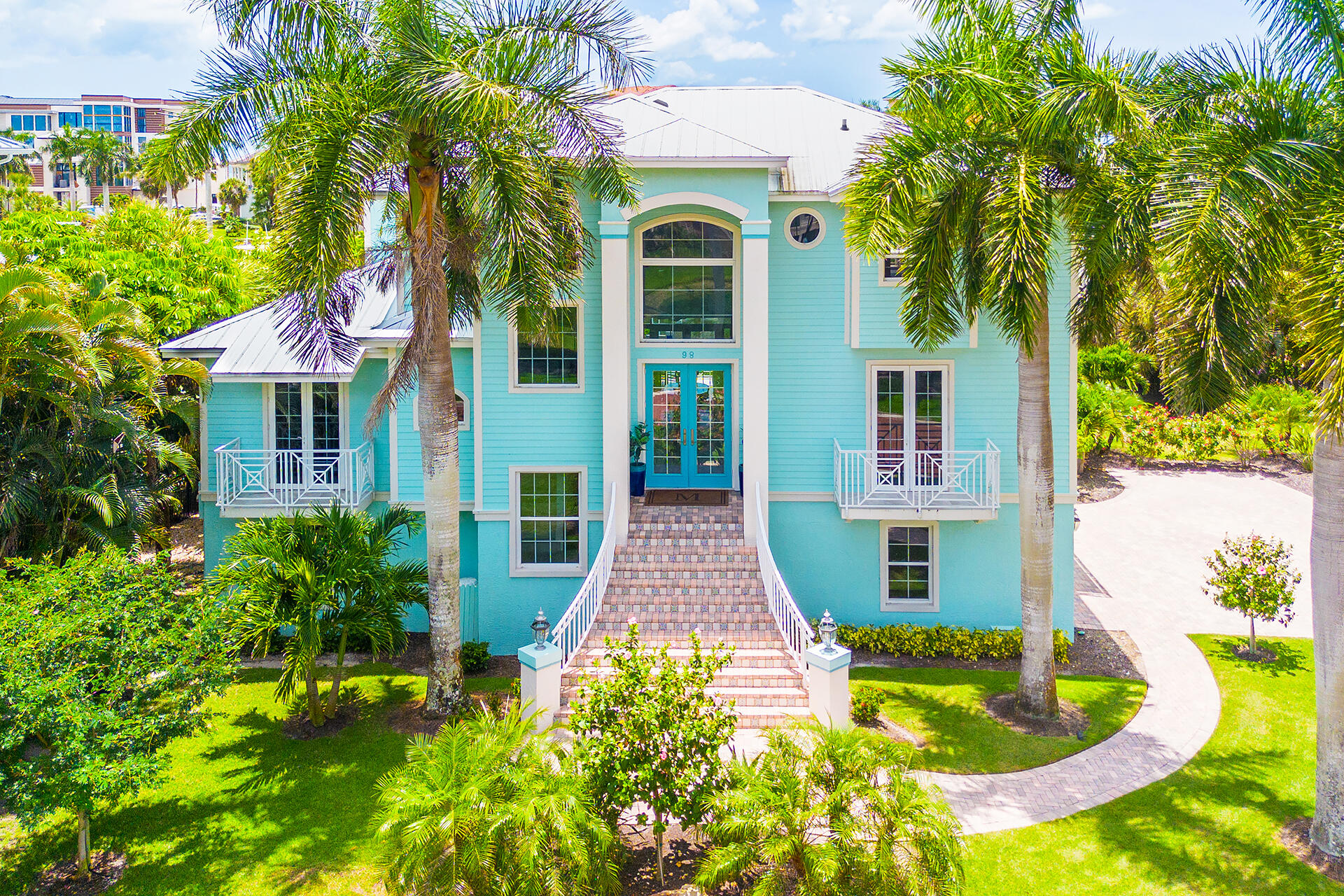 Located within the exclusive, double-gated enclave of Southport on the Bay, just 15 minutes north of Naples, this recently renovated waterfront residence offers a rare combination of close Gulf proximity and direct Bay frontage—a lifestyle pairing that is highly sought after and rarely available. With just a short walk to deeded beach access and direct boating access via private lifts, the property delivers the best of both worlds: beach and boating. Southwestern rear exposure provides optimal sunlight and stunning sunset views over the Bay. • One of the closest homes to the Gulf in Southport • Private homesite with no neighbors on three sides • Direct Gulf access via private boat lifts  • Recently renovated condition (move-in ready) • New dock, dock poles and two new electric boat lifts • New sprinkler system • Newly sodded lawn • New $150K of Landscaping  • New kitchen cabinets and countertops (quartz) • New refrigerator, cooktop, and built in ovens • New washer and dryer • New HVAC on the ground floor • New pool surfacing  • New natural stone pool decking • New fence around the pool. • New pool heater- electric • New patio and pavers leading down to the dock • New landscape lighting  • New tile on the entire 2nd floor (living space) • New Hunter Douglas power blinds in family room and master bedroom. • New iSpring water filter under sink • New kitchen faucet, sink, dishwasher and disposal  • House painted 2 years ago inside and out  • 5 year old metal roof • All pavers just power washed and sealed • New elevator