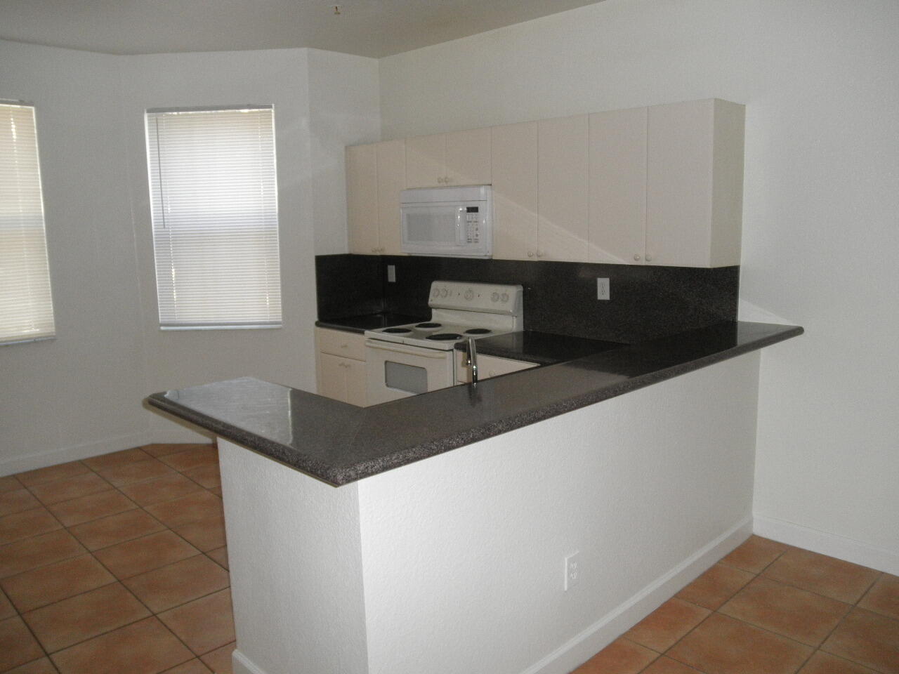 SHOMA TOWNHOMES AT ROYAL PALM BEACH CONDO - Residential Lease