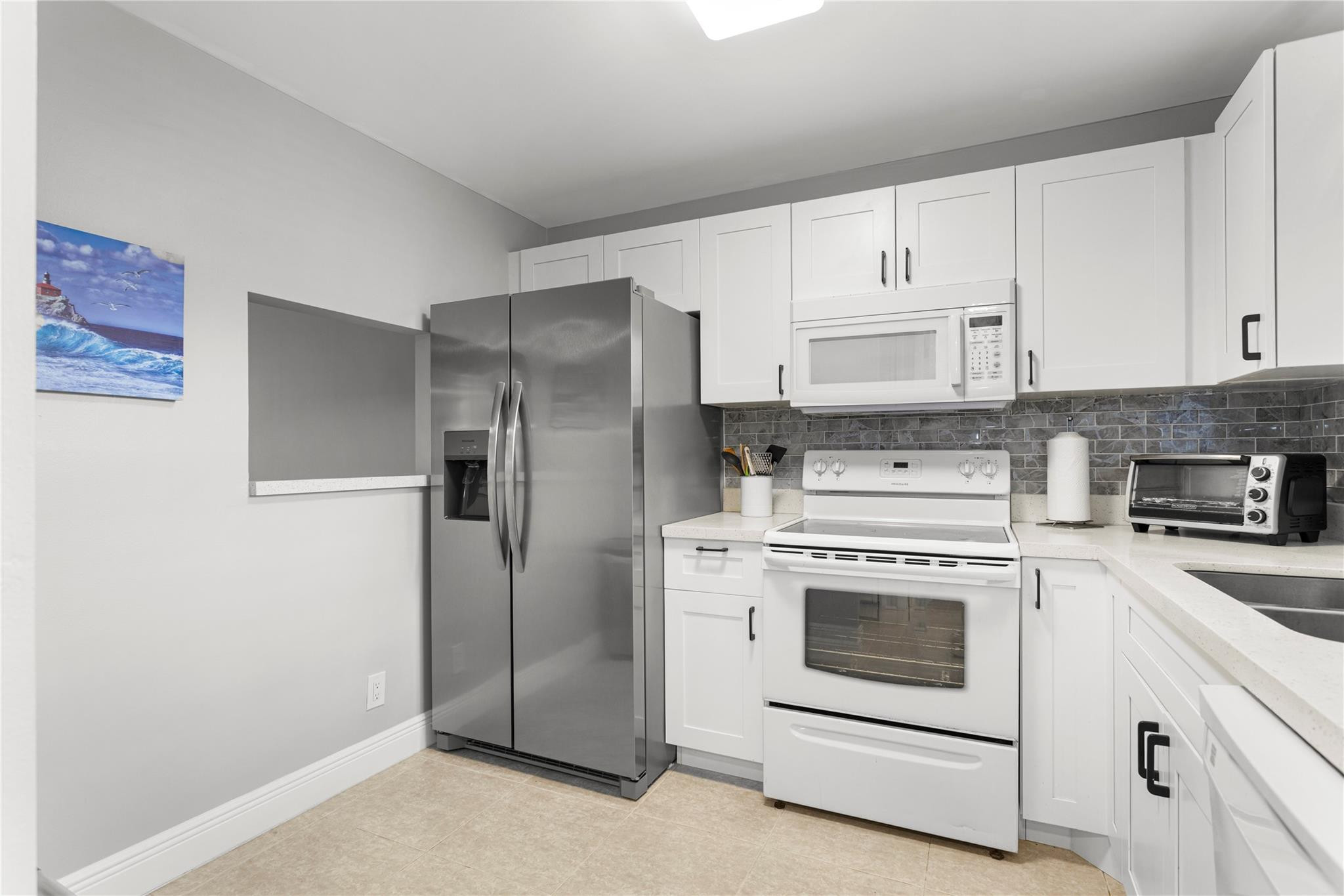 Enjoy easy, worry-free living in this beautifully renovated first-floor, corner 1-bedroom, 1.5-bath furnished senior condo. Recently updated with AC (2023) and new water heater and stainless steel refrigerator (2025), this move-in-ready home is ideal for a relaxed retirement lifestyle. Unwind with peaceful lake views from the enclosed, Florida room—an exclusive builder feature offering year-round comfort and added living space. The active adult community features a clubhouse, heated pool, fitness center, and social activities. Conveniently located near Sawgrass Mills Mall, Amerant Bank Arena, shopping, dining, and entertainment, with easy access to I-75, I-595, and the Sawgrass Expressway.