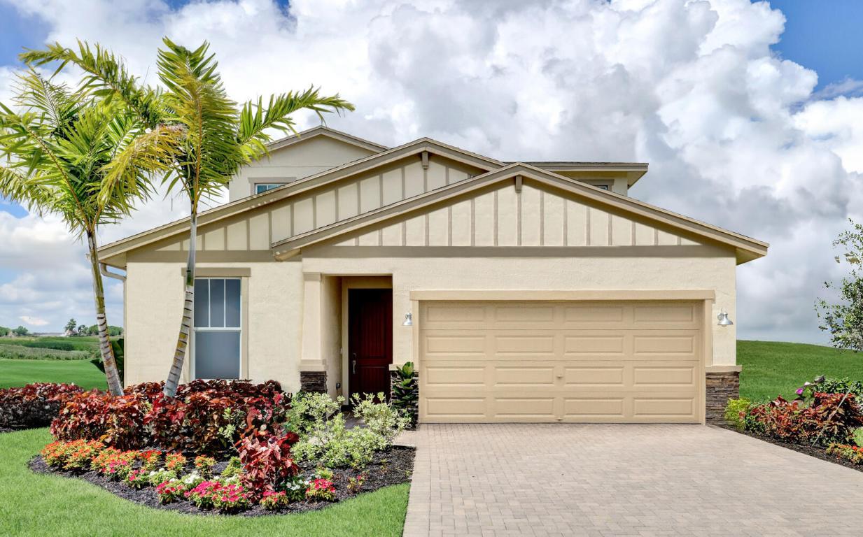 Exclusive to active adults 55+ and better! This two-story home has a bedroom suite on each floor, both with private bathrooms, offering an ideal setup for shared living. An open kitchen overlooks the Great Room, which has access to the dining room and a covered lanai. On the same floor is the private owner's suite with an adjoining bathroom. A bedroom suite is found upstairs with a spacious loft that offers endless possibilities for homeowners. Photos are for illustrative purposes only.