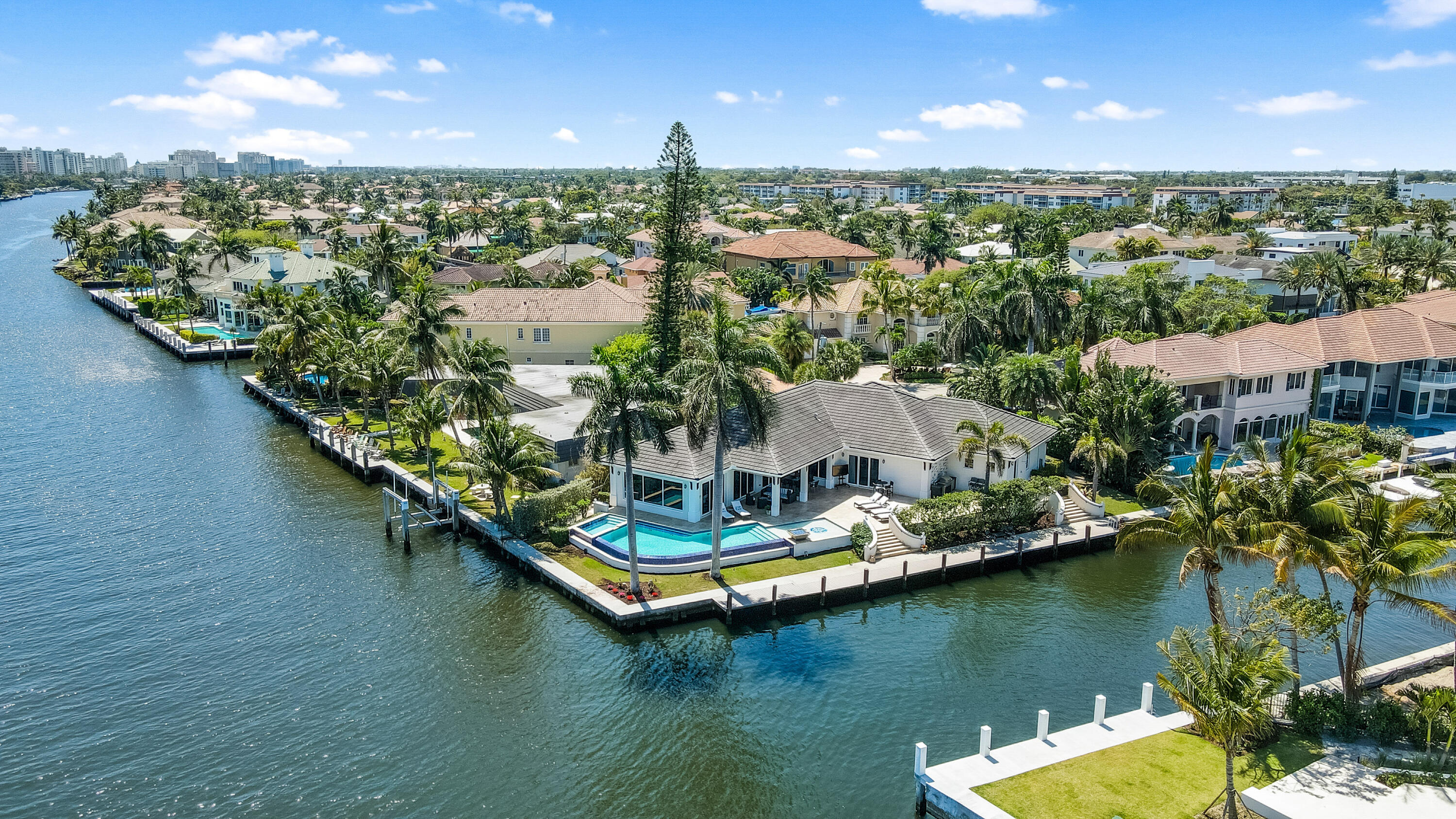 OPEN HOUSE SATURDAY APRIL 9, 2022 FROM 11:00 - 2:00             SPECTACULAR CUSTOM BUILT  INTRACOASTAL POINT LOT WITH 200 FEET OF SEAWALL AND A 100 FOOT DOCK JUST MINUTES TO THE BEACH AND ATLANTIC AVENUE.   THIS 3 BR 3.5 BA W/ DEN WAS BUILT WITH THE FINEST FINISHES AND MATERIALS, MARBLE FLOORS, WOOD FLOORS, CUSTOM MILLWORK THROUGHOUT,  GOURMET CHEF'S KITCHEN W/ THERMADOR APPLIANCES, SUB ZERO REFRIGERATOR, WINE COOLER & ICE MAKER, A INFINITI EDGE POOL W/ SUN SHELF AND SPA, W/ FIRE WATER FEATURE, SUMMER KITCHEN.  WHOLE HOUSE CRESTRON SURROUND SOUND SYSTEM, COFFERED CEILING IN FAMILY ROOM W/ FIREPLACE, TRAY CEILINGS IN OFFICE AND BEDROOMS, ELECTRONIC SHADES INSIDE AND OUT, TESLA CHARGING STATION IN GARAGE. BRYANT A/C UNITS REPLACED IN 2019 & 2020, NEW POOL HEATER 2021. FURNITURE IS NEGOTIABLE