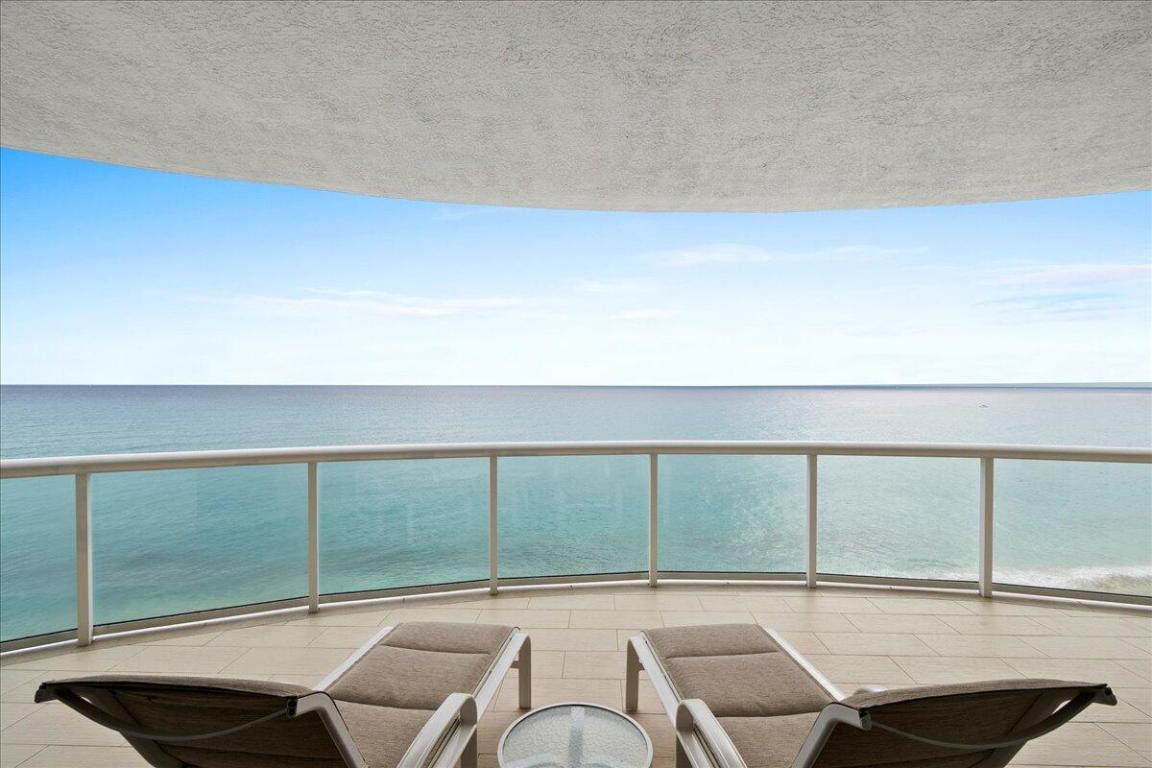 FULLY FURNISHED ( EXCLUDING ARTWORK) BEACHFRONT RESIDENCE OFFERING TRULY DIRECT UNOBSTRUCTED VIEWS OF SINGER ISLAND'S ATLANTIC OCEAN.....PORCELAIN TILE  ALLOVER, SPACIOUS CUSTOM CLOSETS, IMPACT WINDOWS AND DOORS...A MUST SEE!
BEACHFRONT OFFERS 51 PRIVATE RESIDENCES ( 3 PER FLOOR) EACH WITH PRIVATE ELEVATOR TO YOUR FOYER, MANNED GATE, CONCIERGE, PRIVATE BEACH ACCESS, POOLS, STATE OF THE ART GYM, THEATRE ROOM ANDS SOCIAL ROOM. 
EASY TO SHOW....